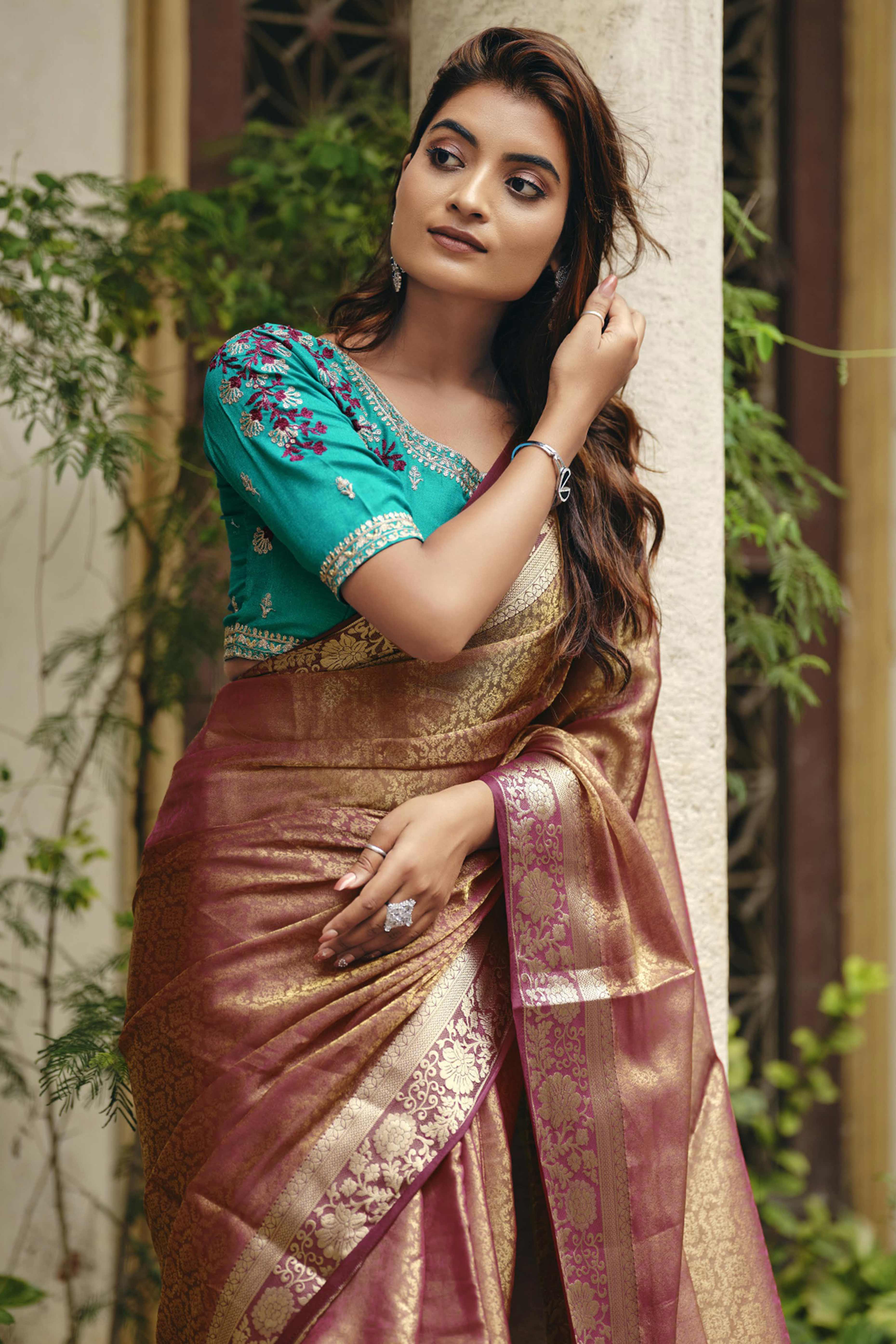 Elegant Purple Partywear Nylon Silk Saree with Stone & Weaving Details