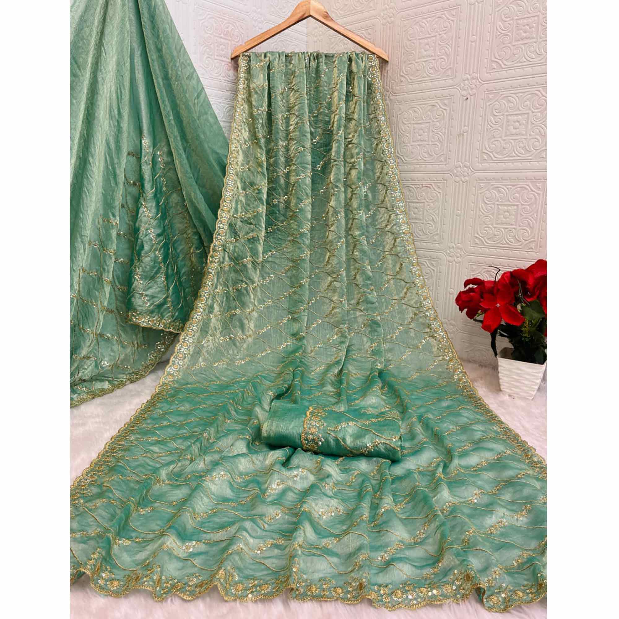 Sea Green Partywear Organza Chiffon Silk Saree Highlighted with Fine Sequins Detailing