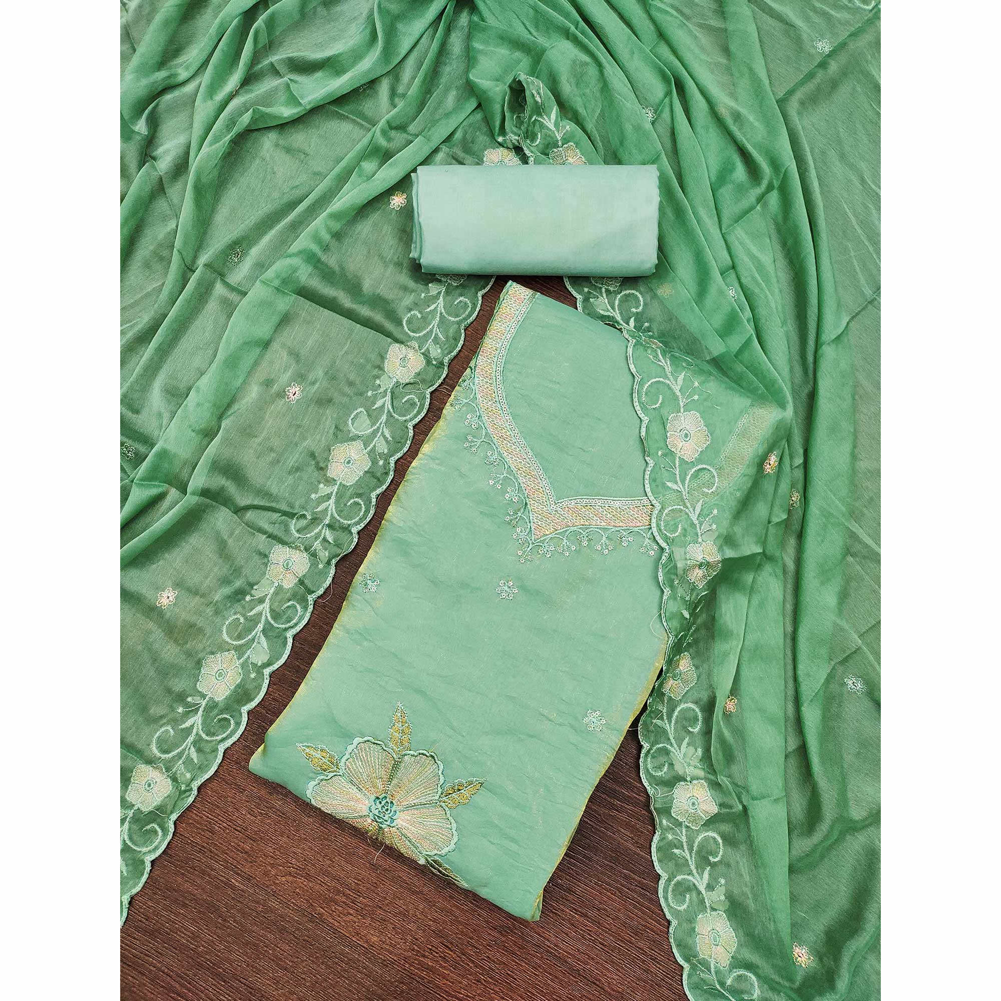 Green Ensemble With Floral Sequins Embroidery Detailing On Satin Viscose Dress Material