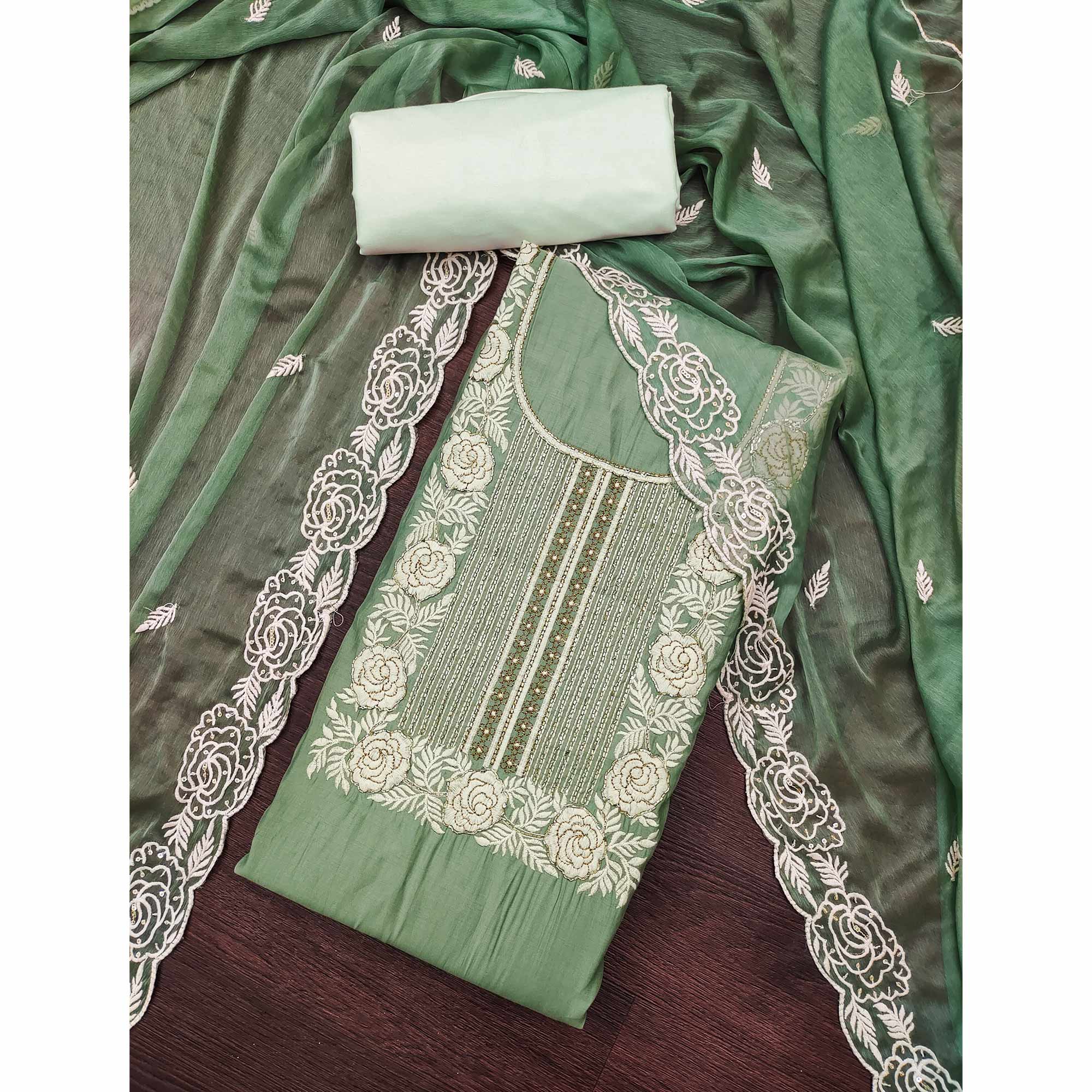 Green Cotton Silk Dress Material Embellished With Floral Embroidery & Intricate Handwork