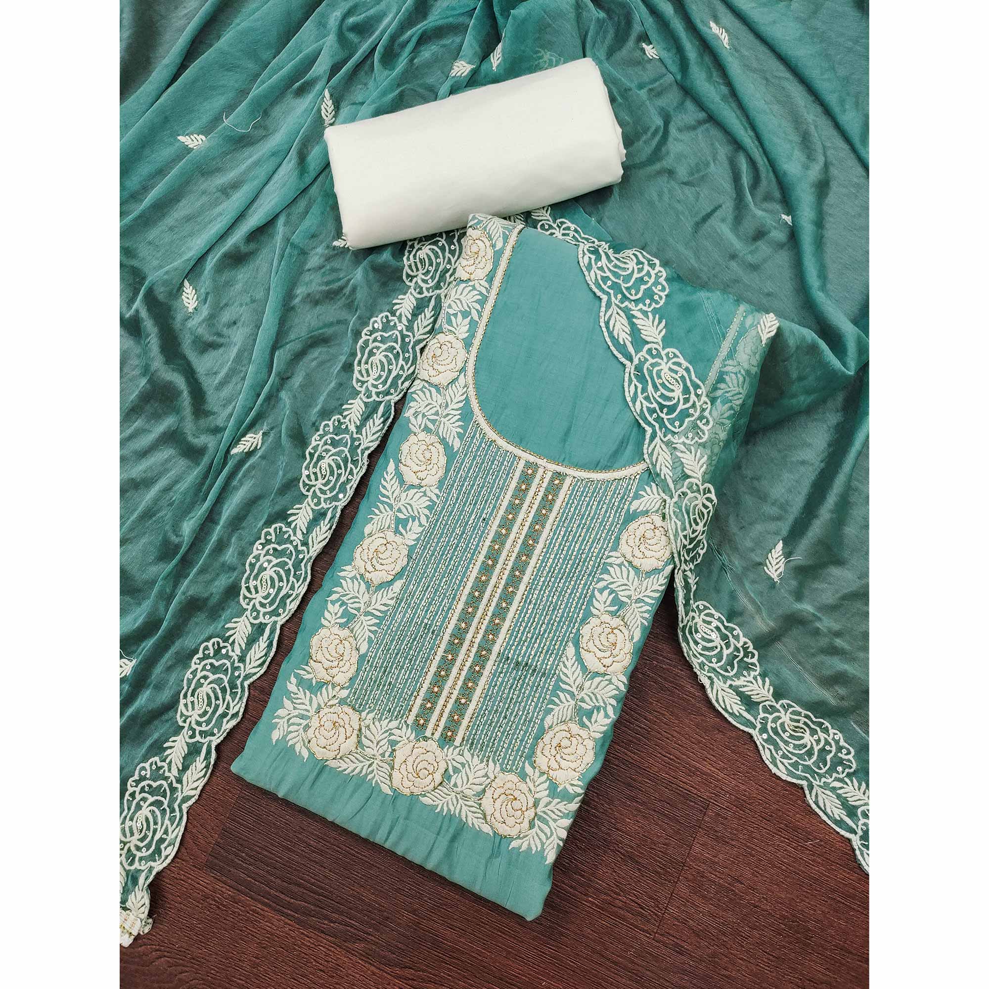 Teal Cotton Silk Dress Material Embellished With Floral Embroidery & Intricate Handwork