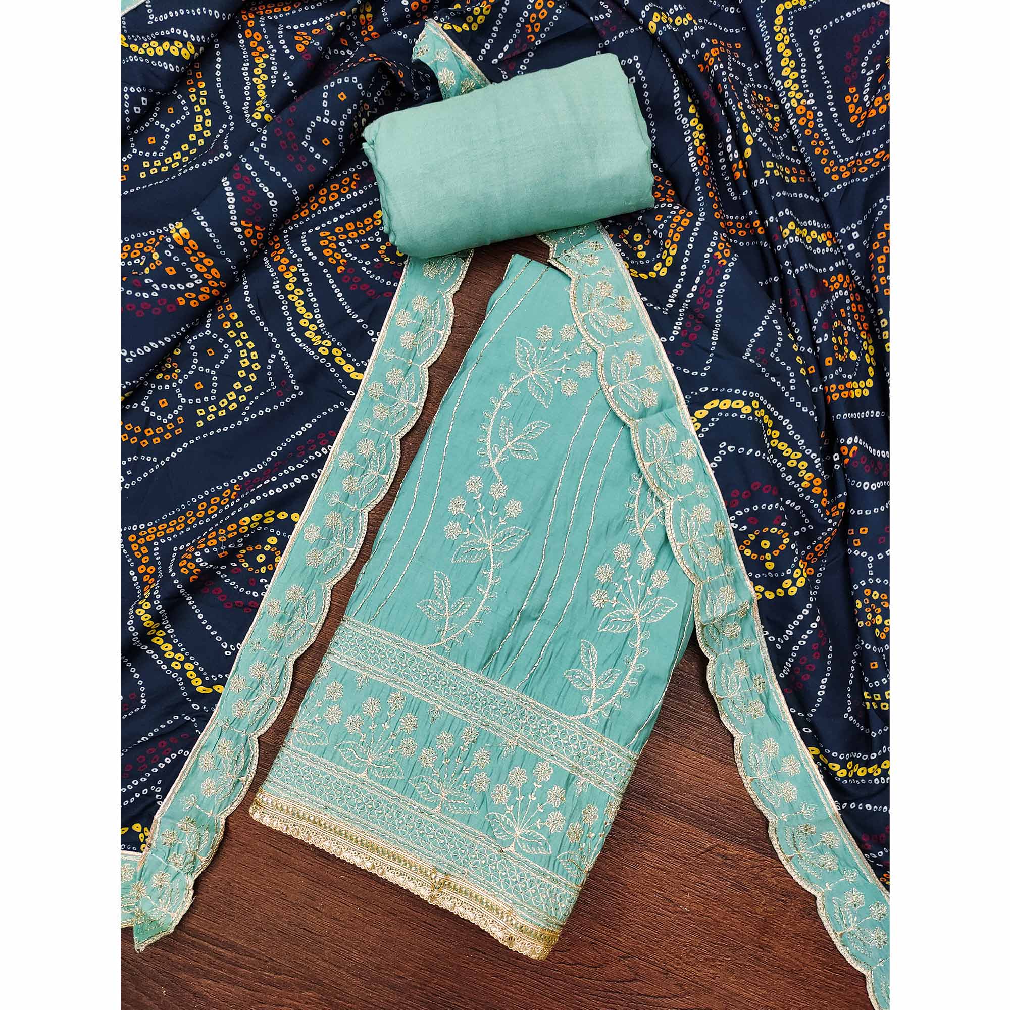 Turquoise Cotton Silk Dress Material Embellished With Elegant Floral Hand Embroidery Work