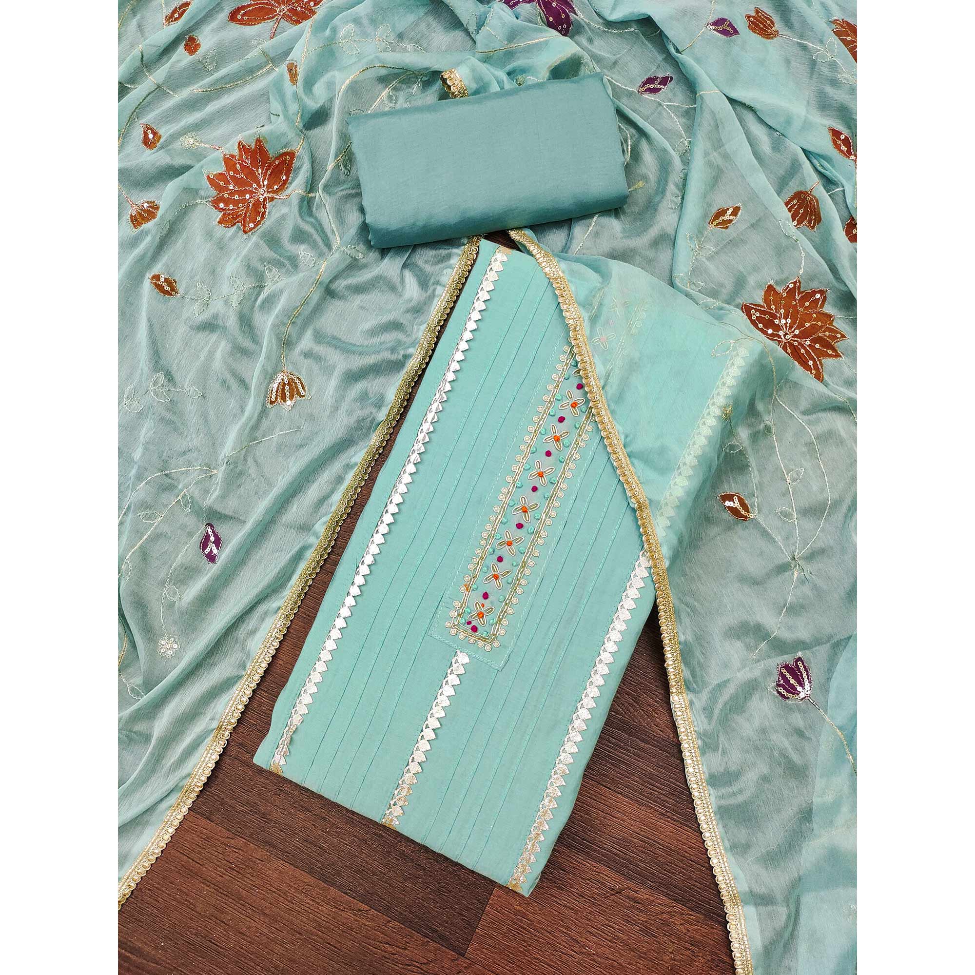 Turquoise Cotton Silk Dress Material Embellished With Elegant Moti Handwork & Gota Patti Lace