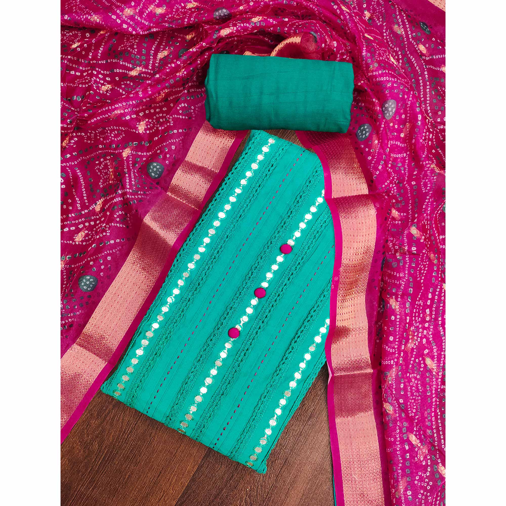 Turquoise Cotton Silk Dress Material Enhanced With Intricate Thread Embroidery & Gota Patti Work