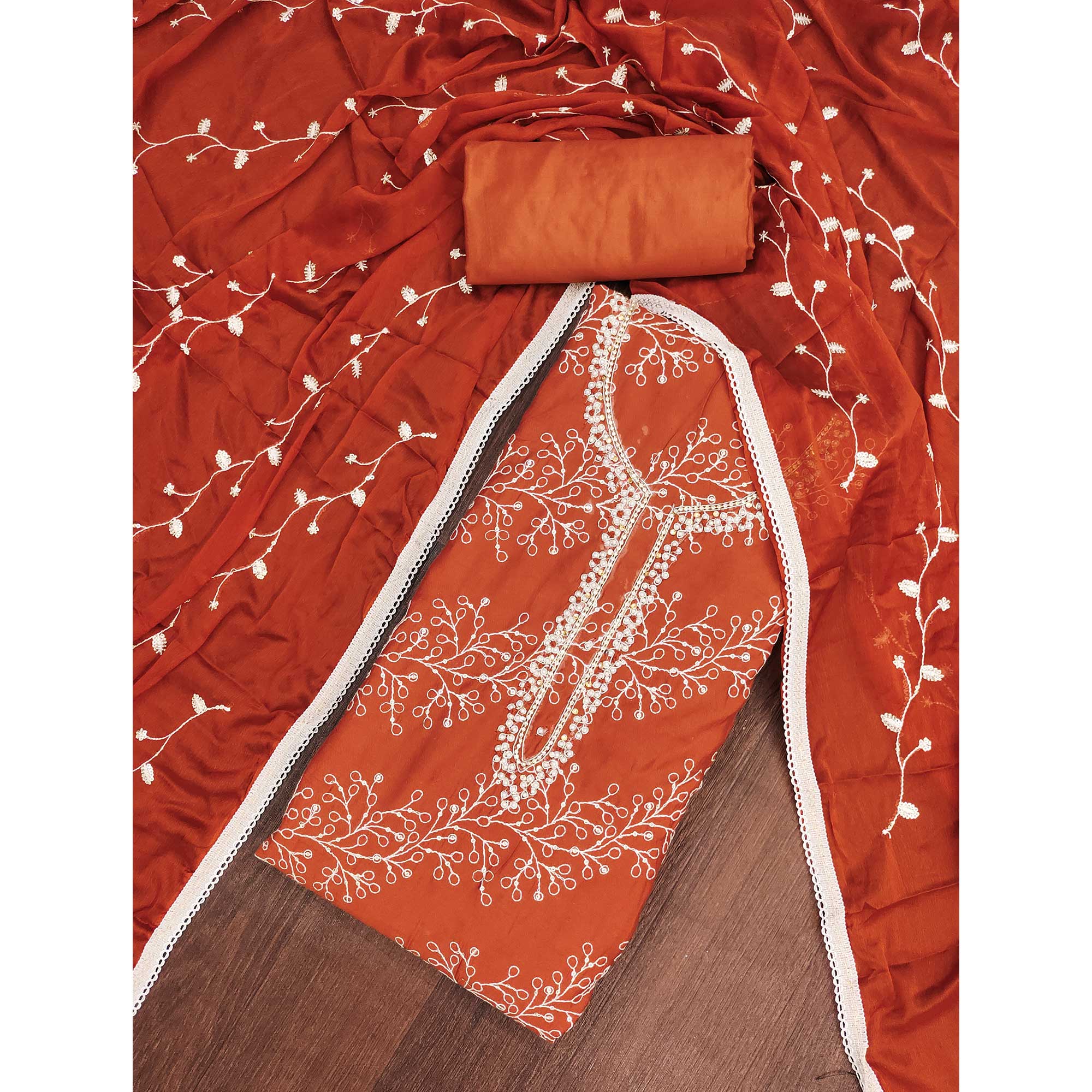 Exclusive Rust Floral Embroidery Cotton Silk Dress Material Enhanced With Moti & Sequins Work