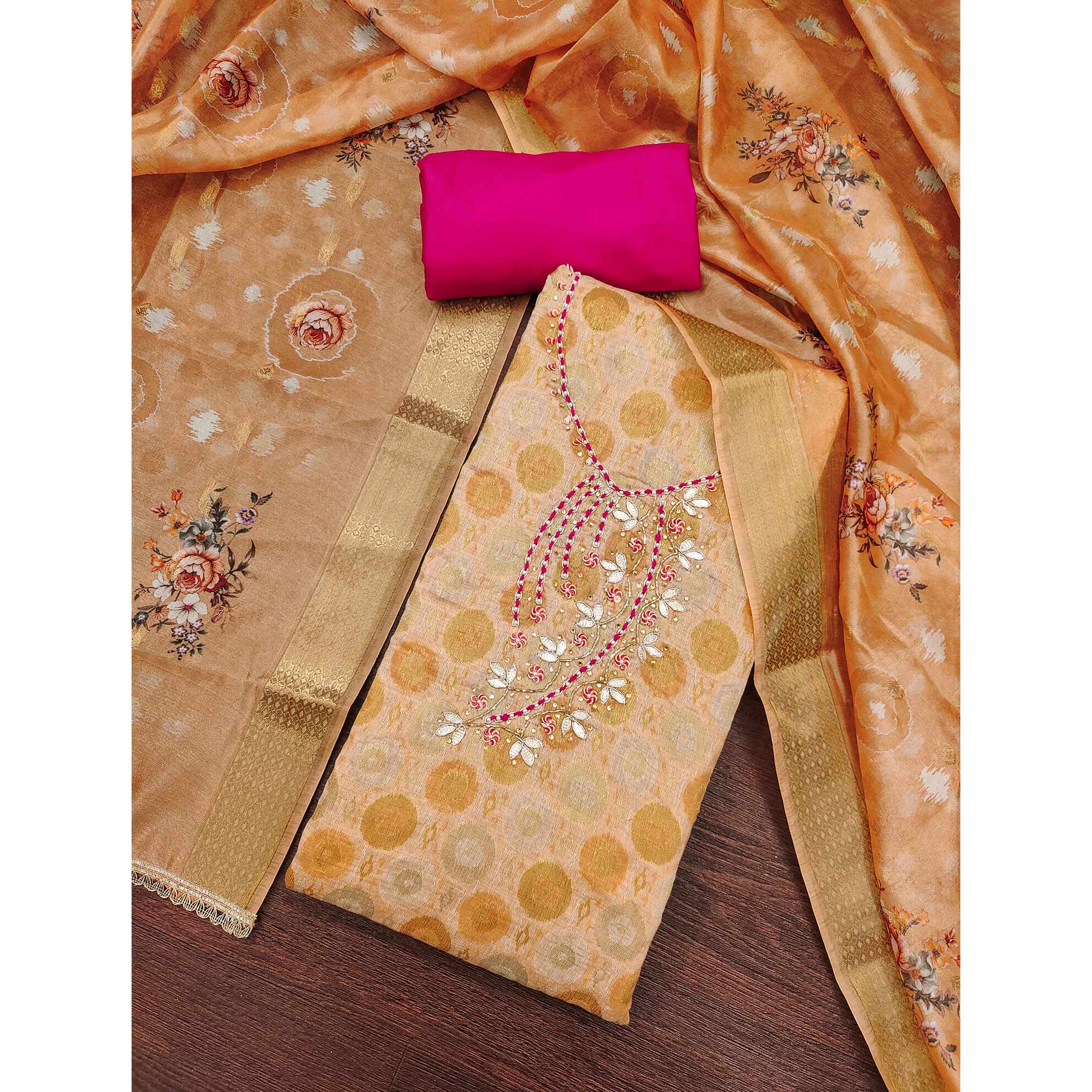 Sophisticated Light Peach Zari Woven Jacquard Dress Material Highlighted With Floral Handwork
