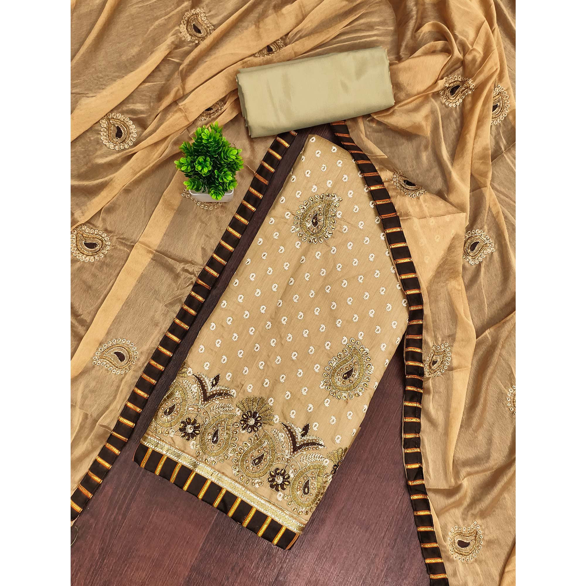 Graceful Chikoo Chanderi Silk Dress Material Adorned With Paisley Embroidery & Moti Hand Work