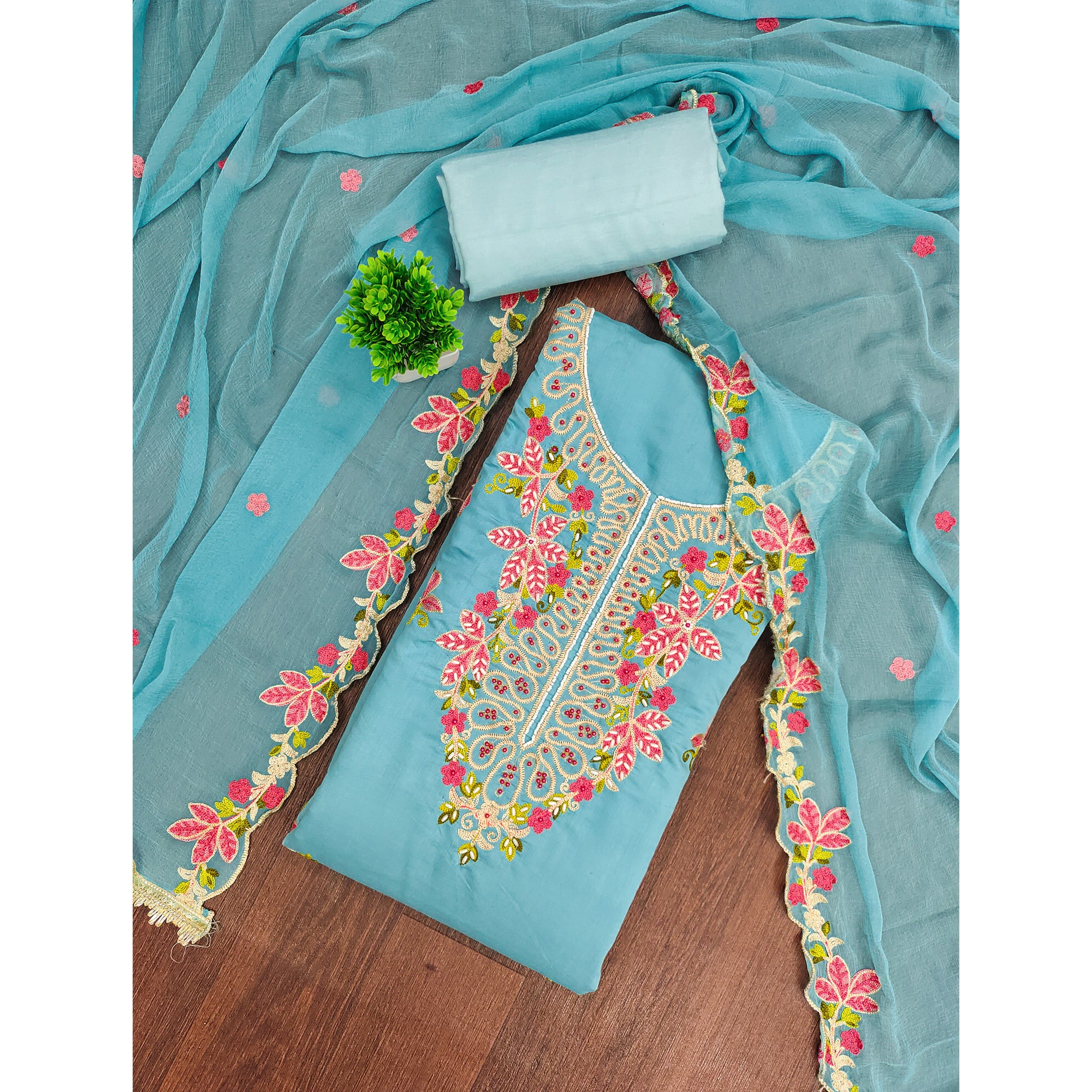 Charming Blue Floral Embroidery Cotton Silk Dress Material Enhanced With Elegant Moti Handwork