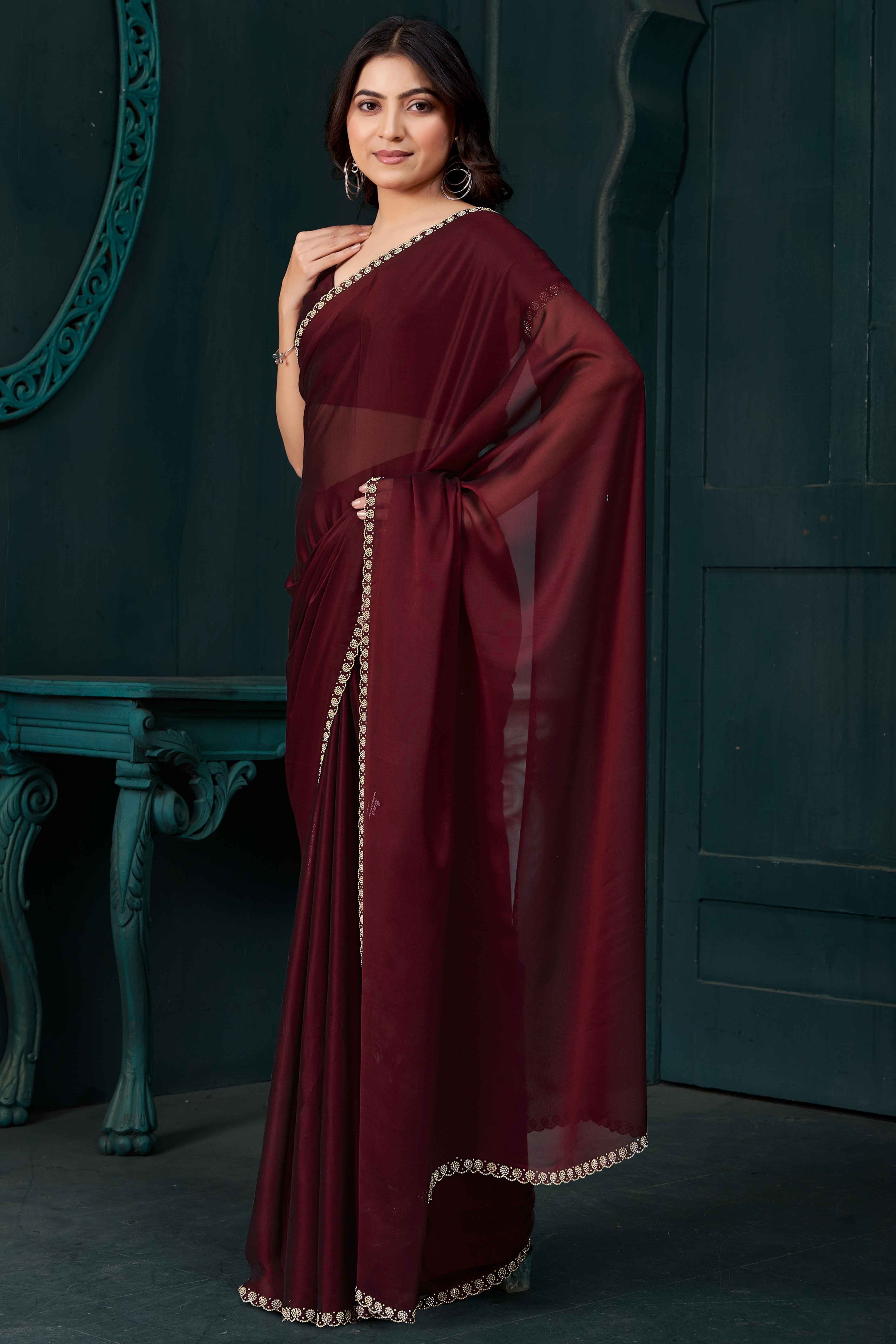 Maroon Crepe Silk Solid Saree with Elegant Zarkan Border Detailing