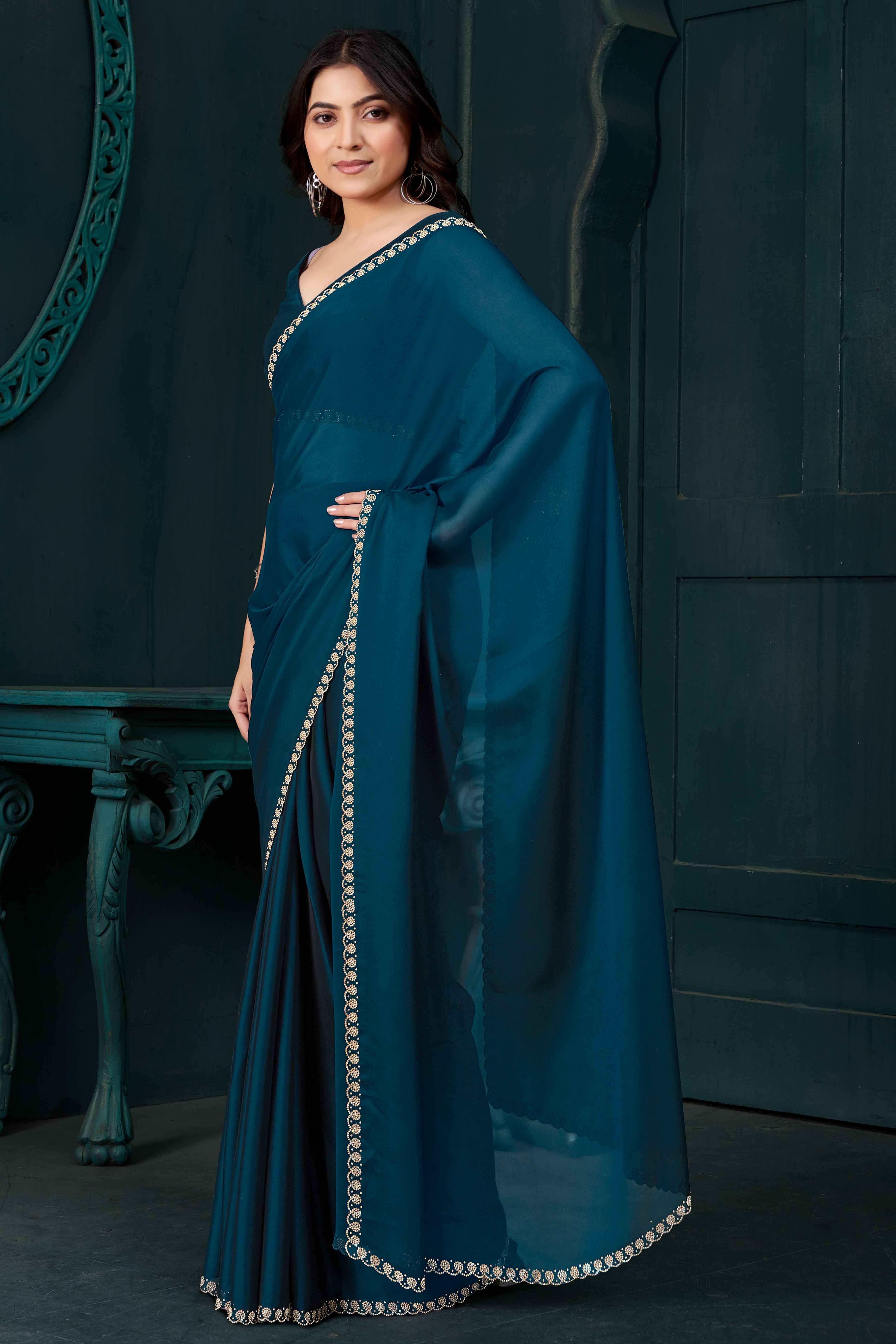 Petrol Blue Crepe Silk Solid Saree with Elegant Zarkan Border Detailing