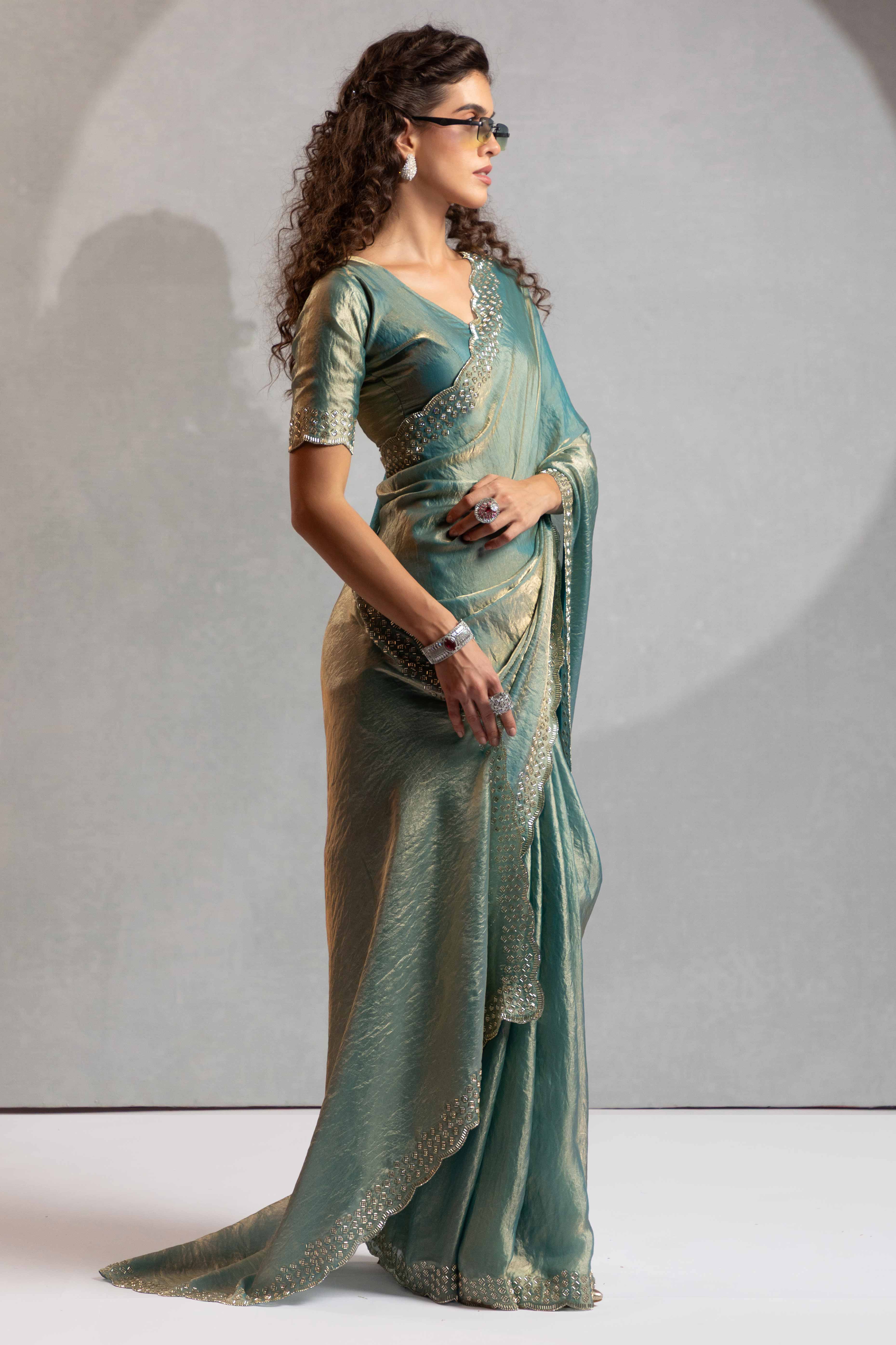 Sea Green Satin Saree with Glamorous Stone Embellishment