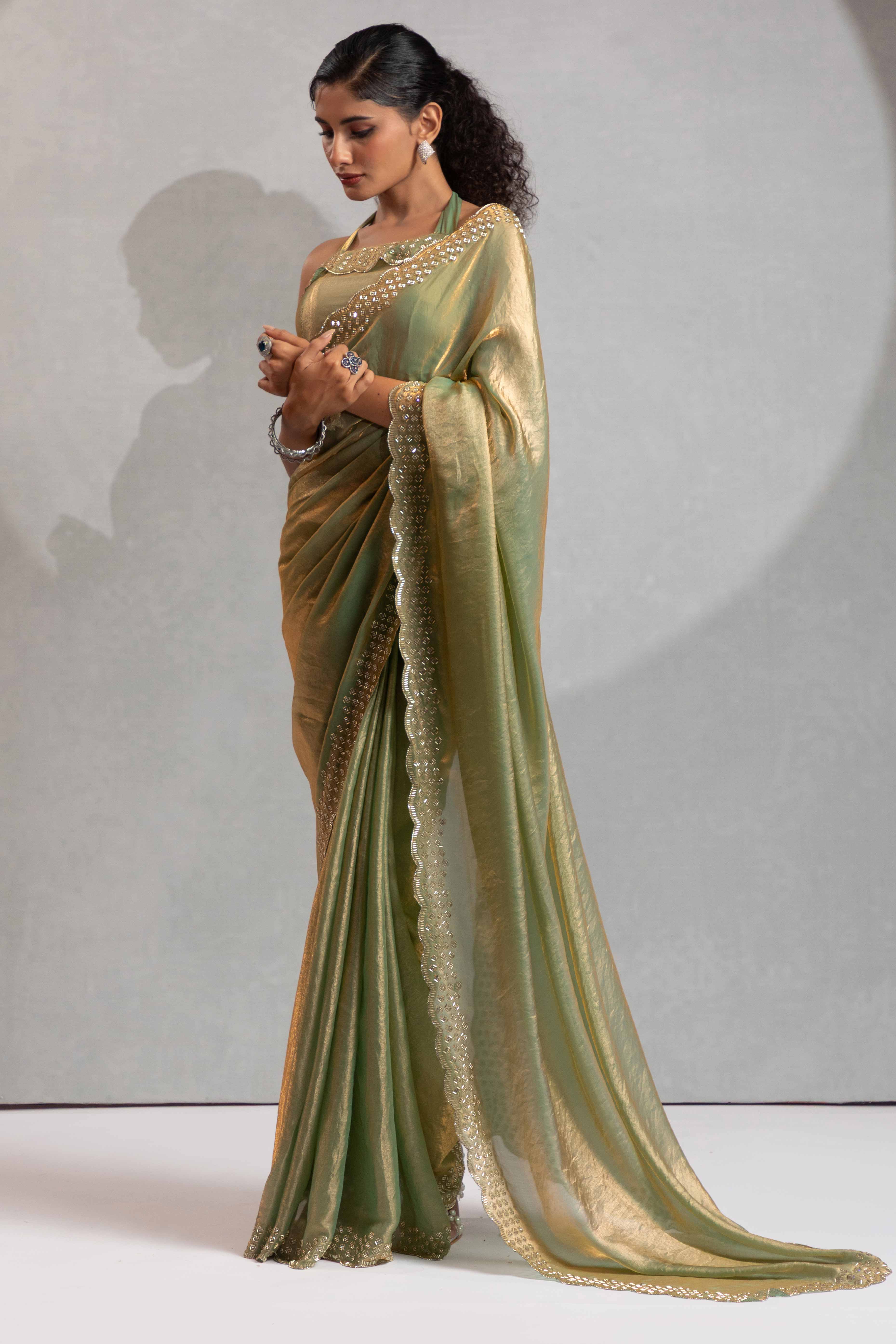Pista Green Satin Saree with Glamorous Stone Embellishment