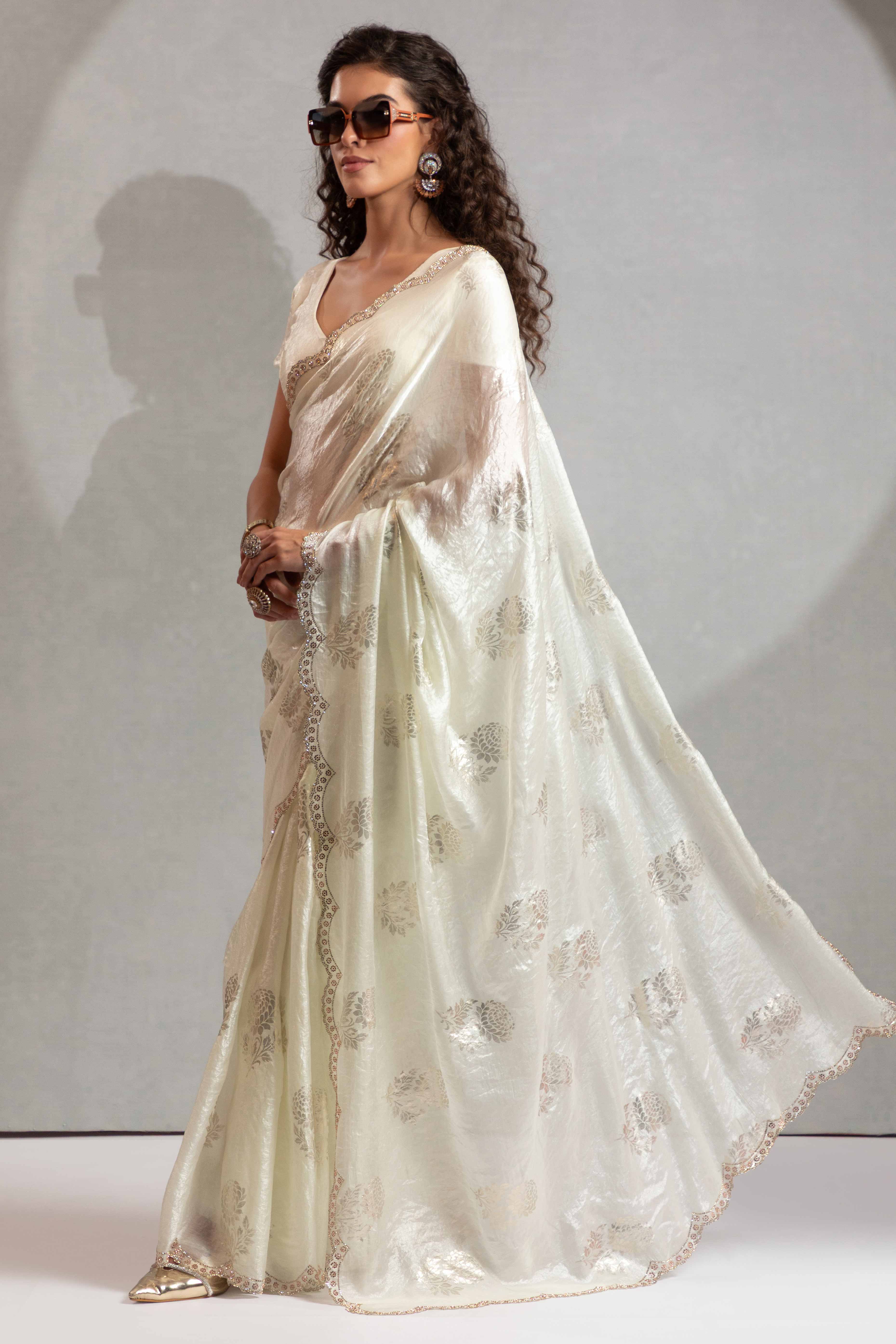 Offwhite Satin Silk Saree Showcasing Elegant Floral Foil Prints & Dazzling Zarkan Work