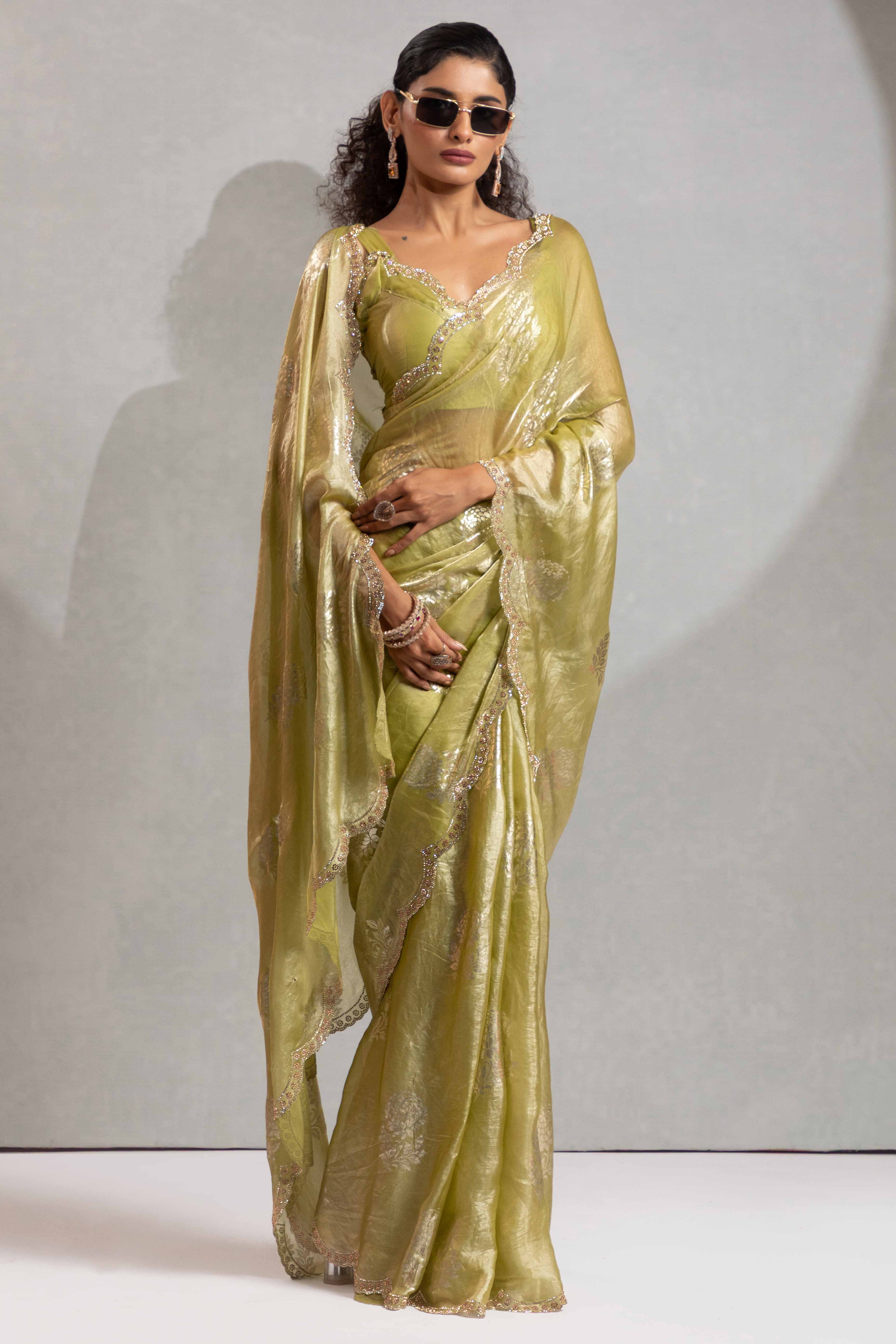 Green Satin Silk Saree Showcasing Elegant Floral Foil Prints & Dazzling Zarkan Work