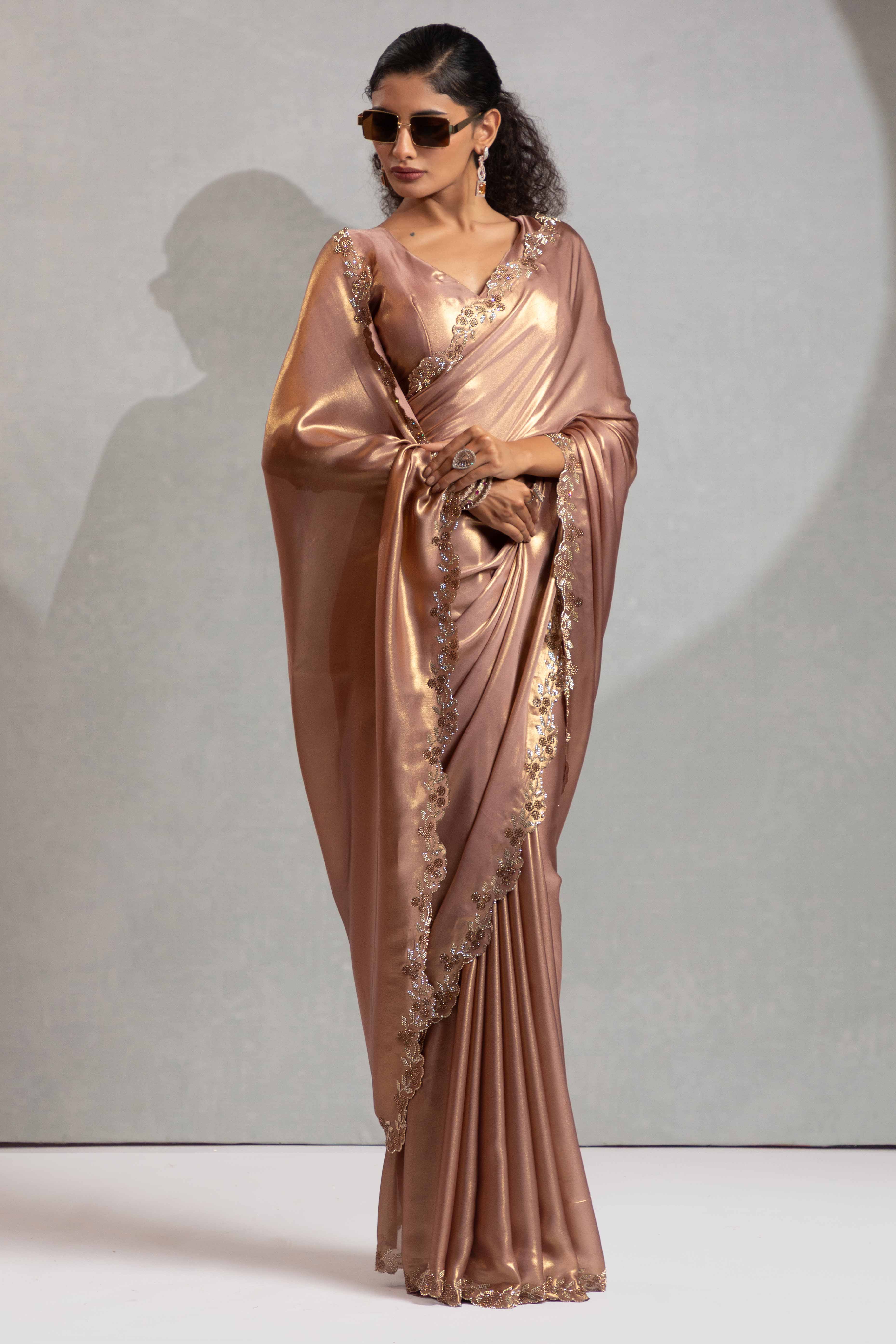 Zircon Brown Satin Georgette Saree Adorned With Subtle Foil Finish & A Sparkling Zarkan Work Border