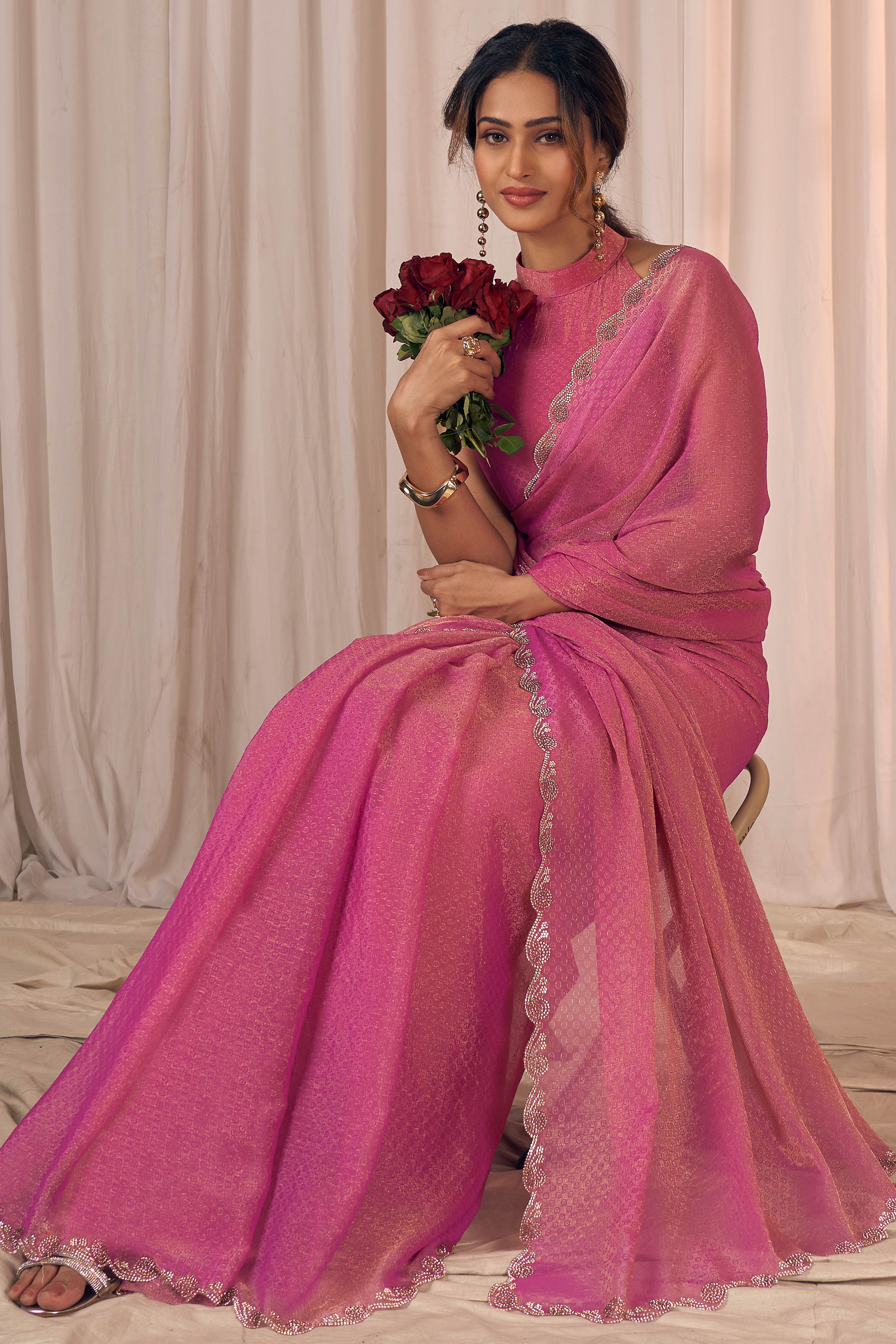 Designer Pink Georgette Saree Adorned With An Elegant Zarkan Cutwork Border