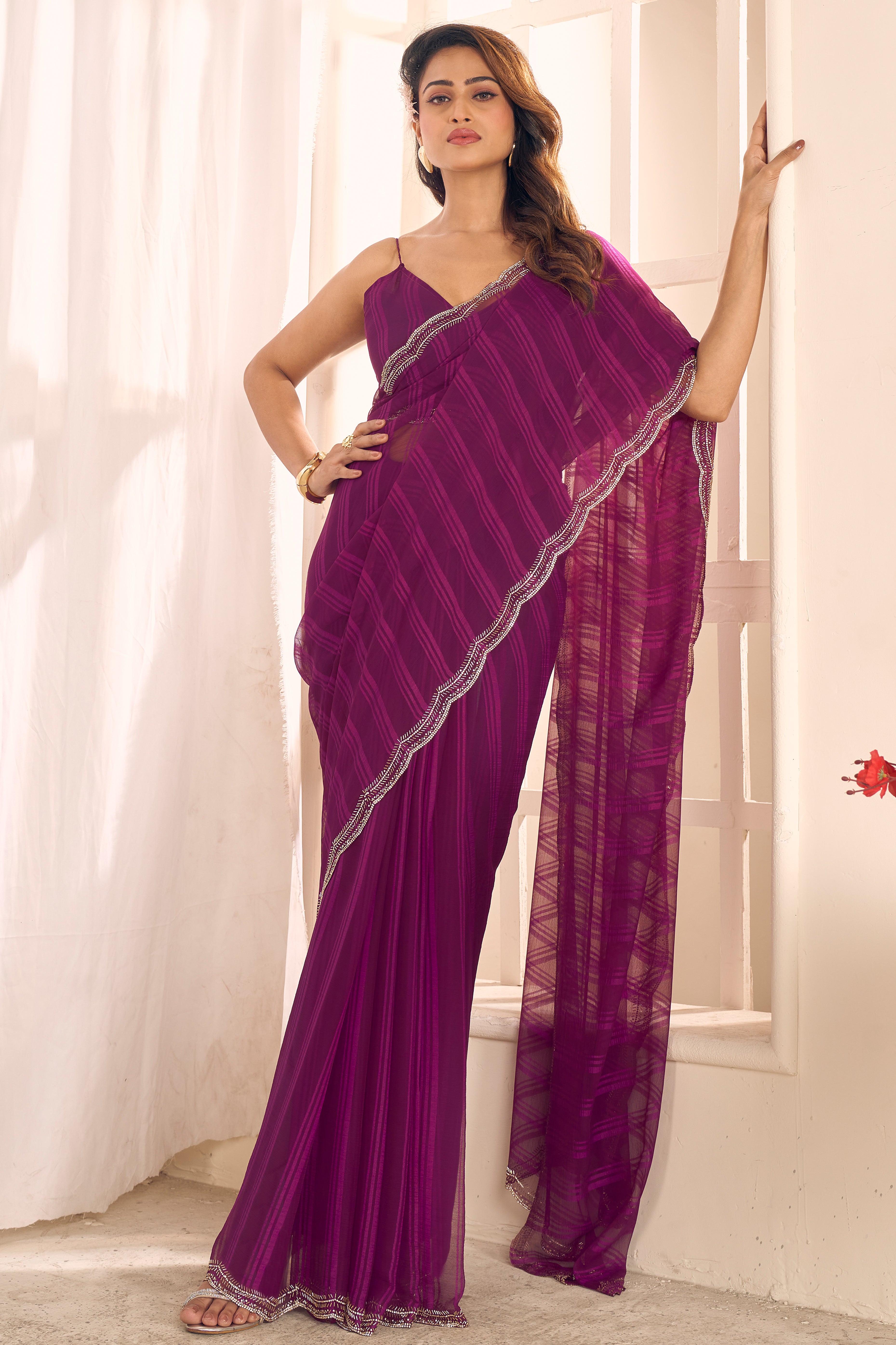 Wine Georgette Saree Featuring Contemporary Stripes With A Sparkling Diamond & Beads Work Border