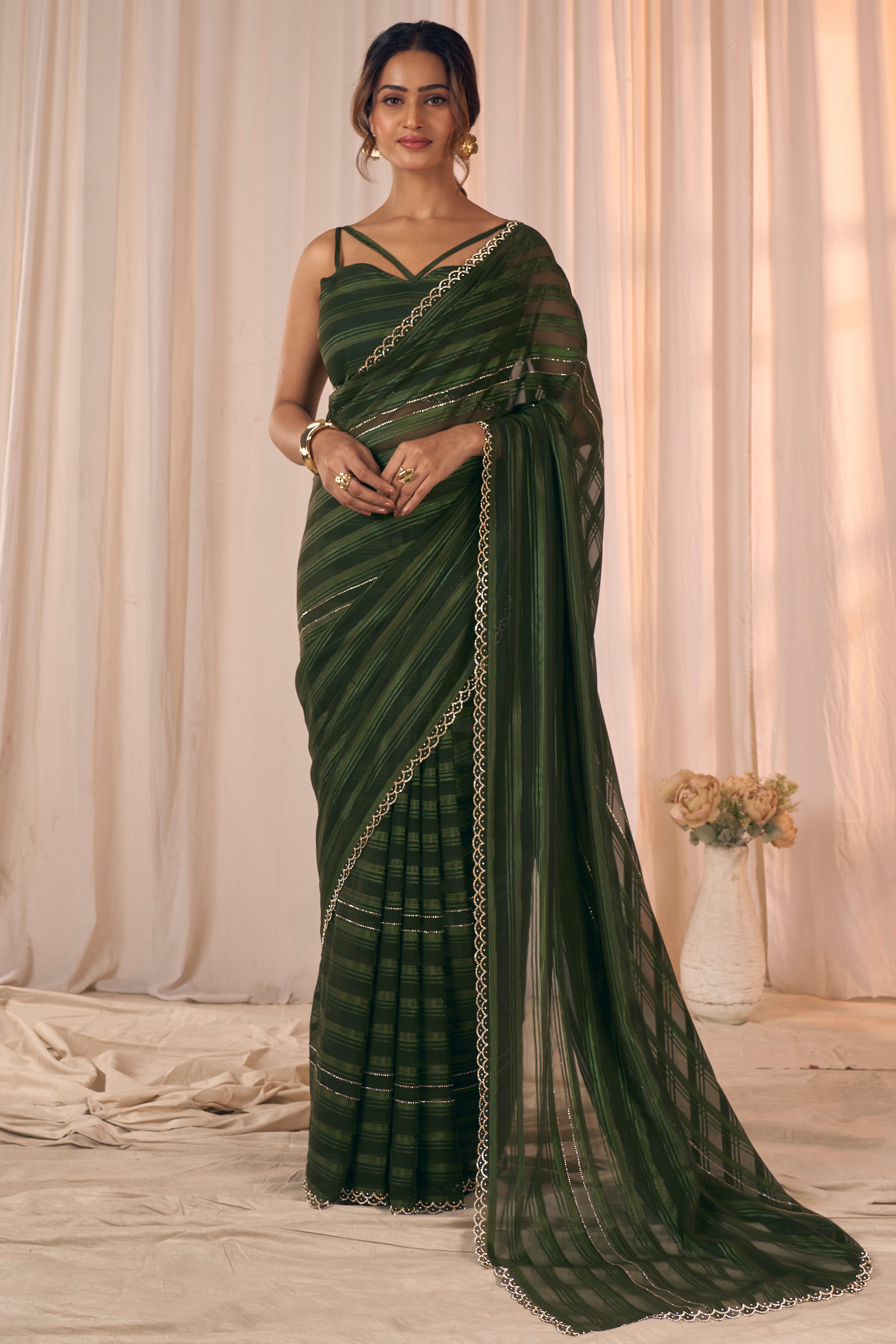 Dark Olive Striped Designer Georgette Saree Adorned With An Elegant Zarkan Cutwork Border