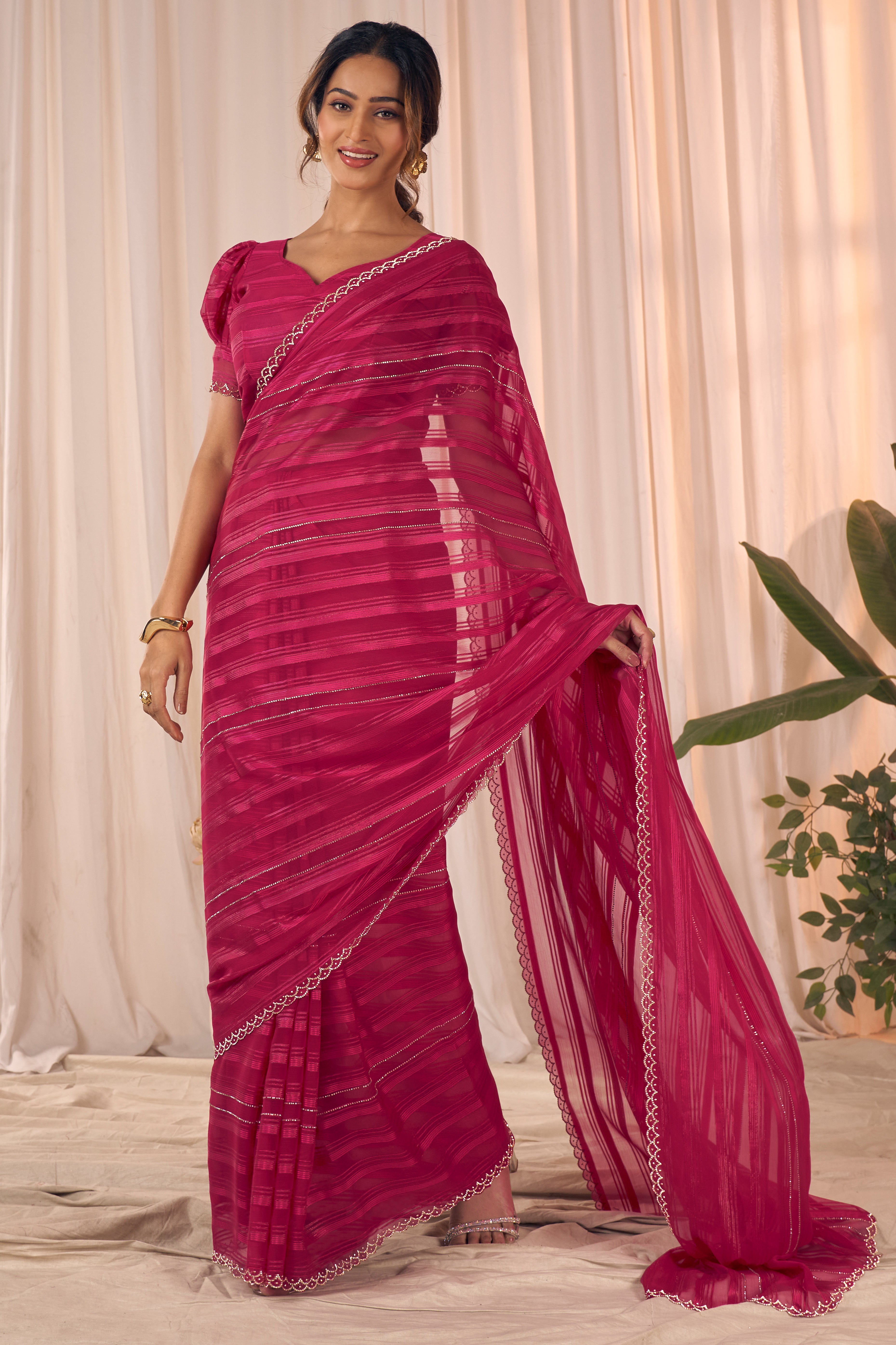 Rose pink Striped Designer Georgette Saree Adorned With An Elegant Zarkan Cutwork Border