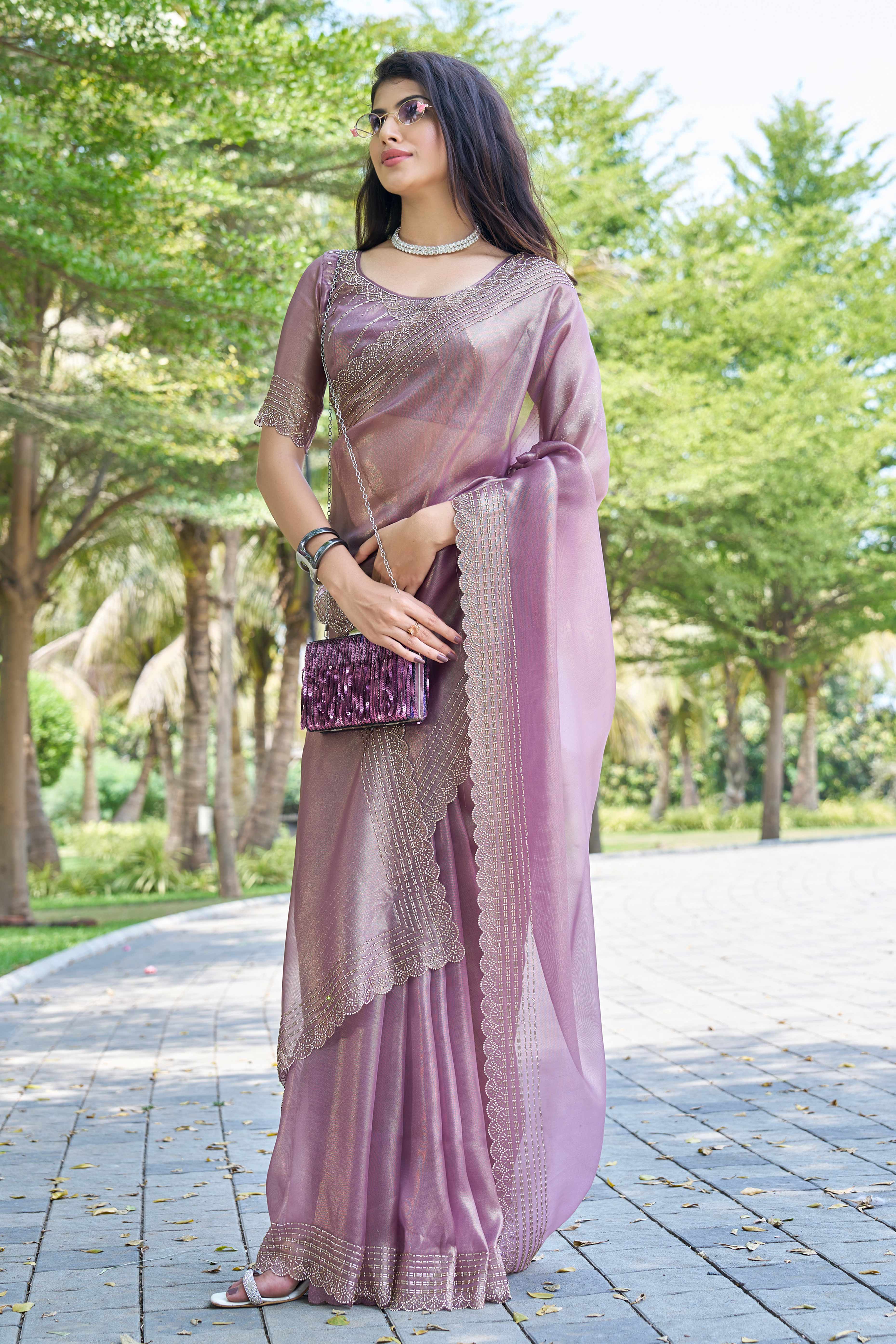 Pastel Purple Soft Organza Saree with Stone Embellishments Work