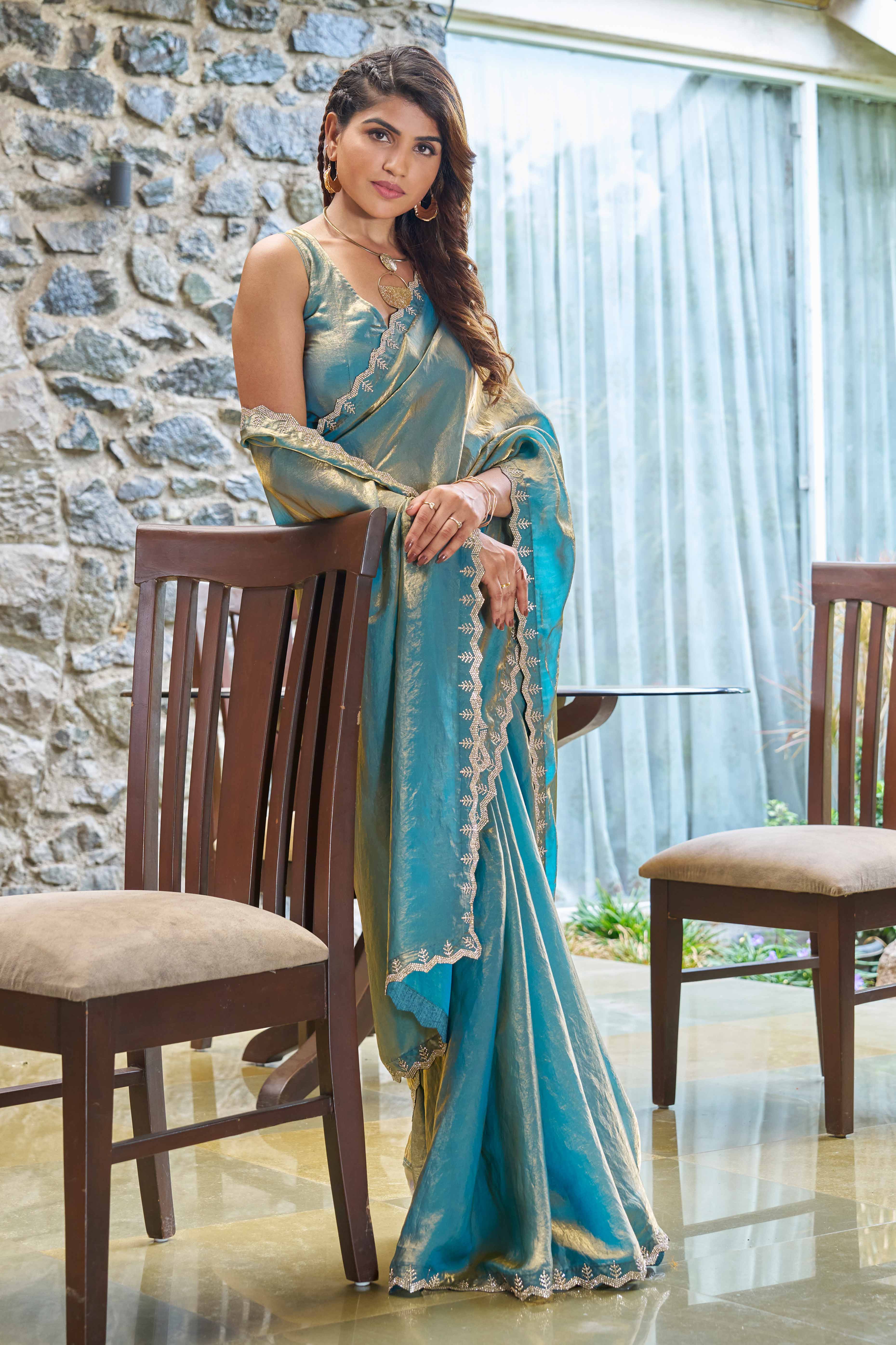 Refreshing Aqua Blue Chiffon Solid Saree With Stunning Zarkan Embellishments