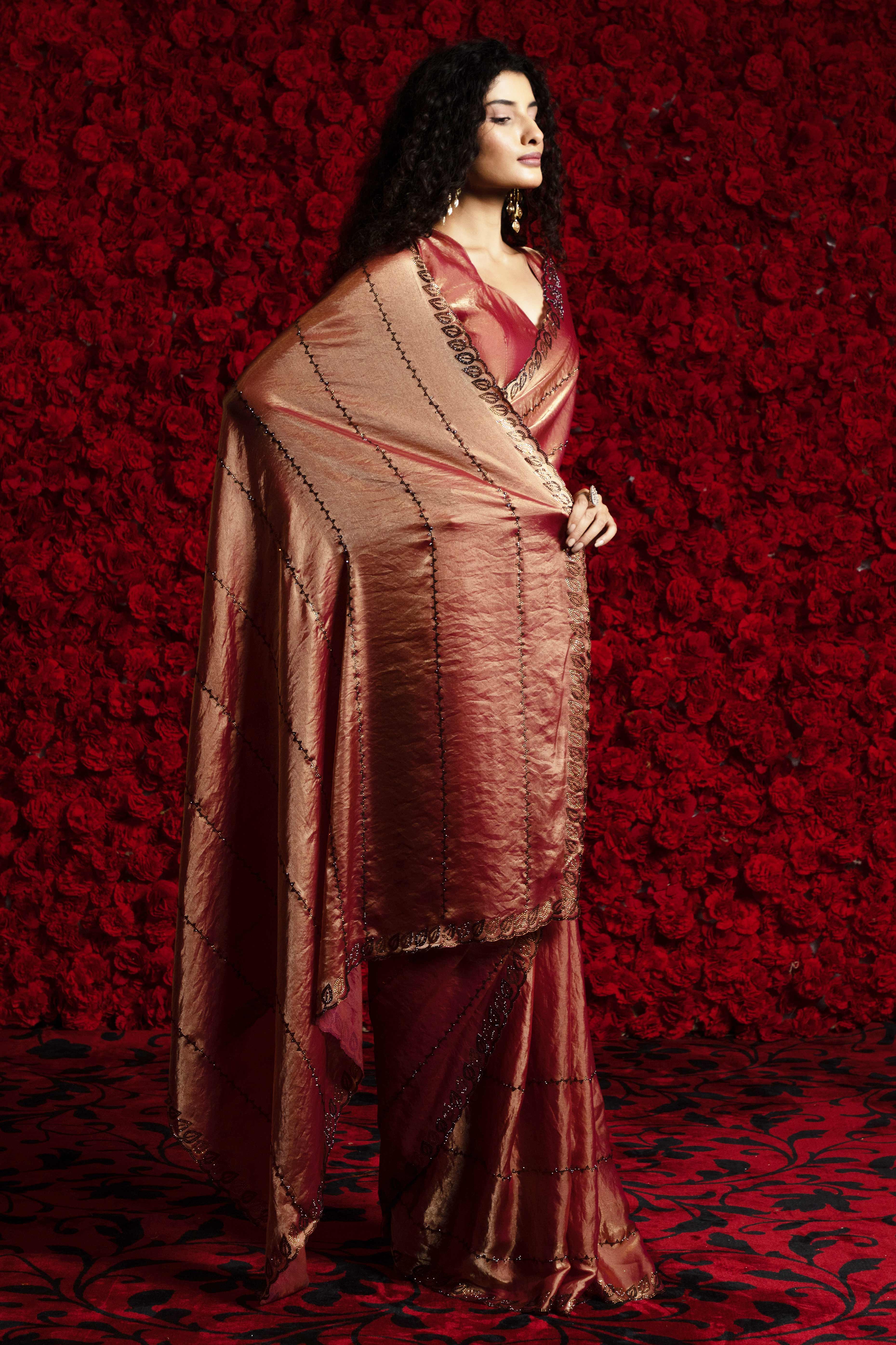 Brick Red Satin Silk Saree with Dazzling Stone Embellishments for Special Occasions
