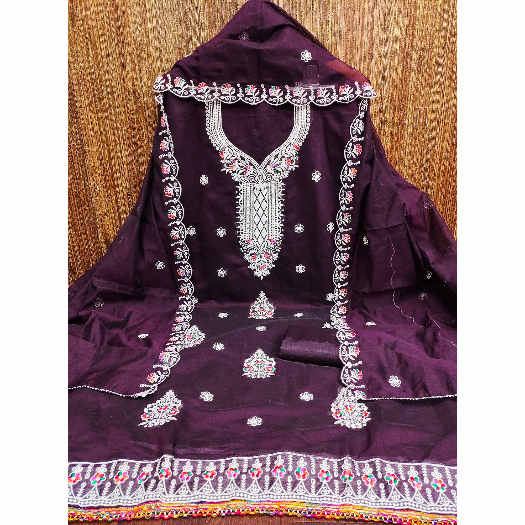 Wine Cambric Cotton Dress Material With Elegant Floral Embroidery Work