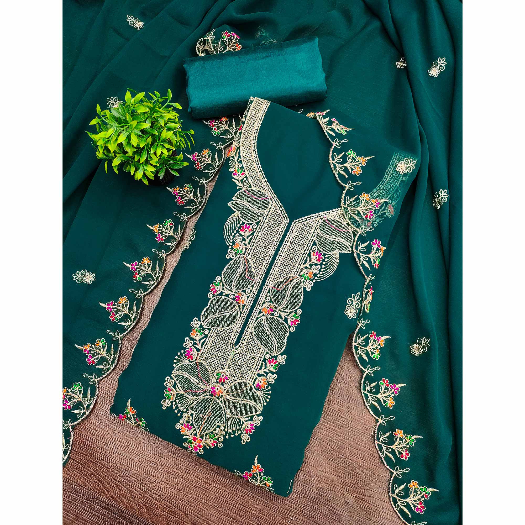 Green Georgette Dress Material Adorned With Floral Embroidery & Elegant Lace Border