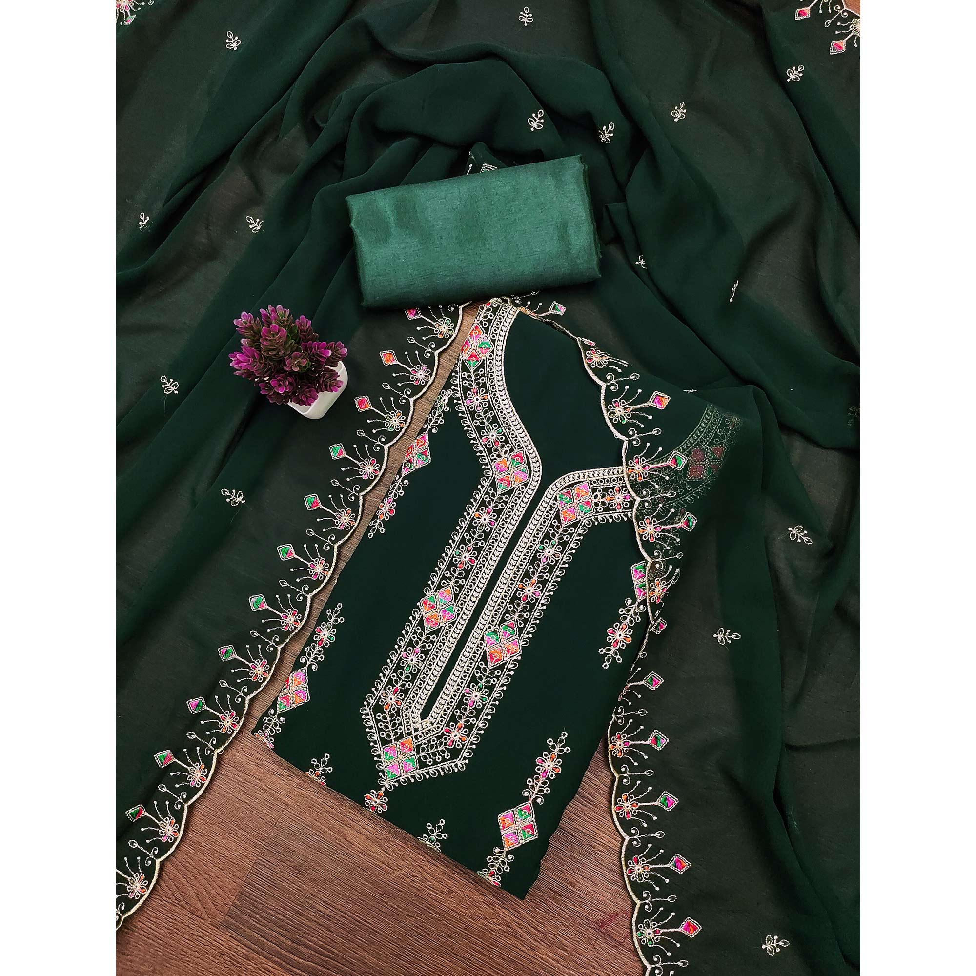 Green Georgette Dress Material Enhanced With Graceful Floral Embroidery For An Elegant Ethnic Look