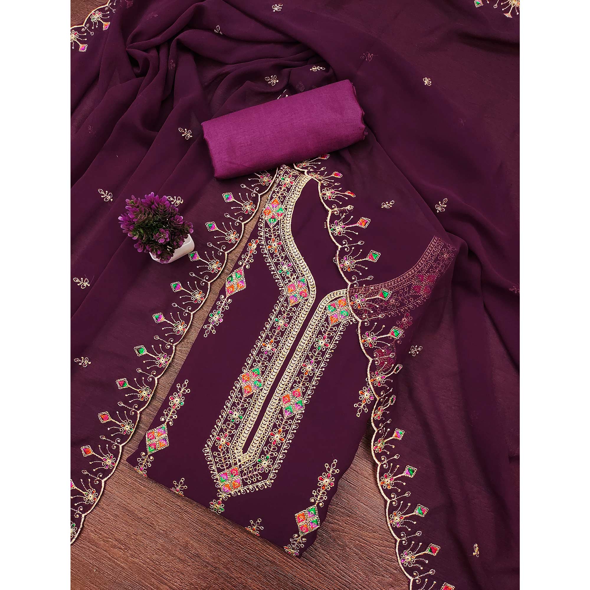 Wine Georgette Dress Material Enhanced With Graceful Floral Embroidery For An Elegant Ethnic Look