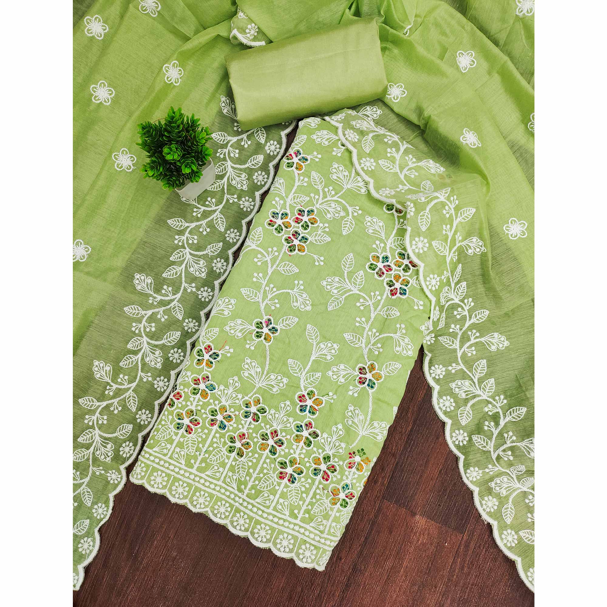 Light Green Chanderi Cotton Dress Material Adorned With Elegant Floral Thread Embroidery Work
