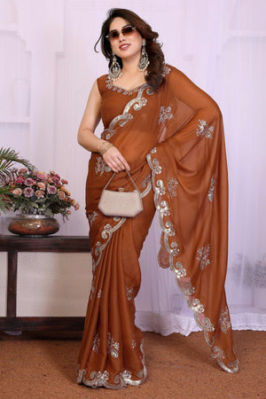 Charming Brown Floral & Peacock Motif Georgette Saree Enhanced With Sequins Embroidery