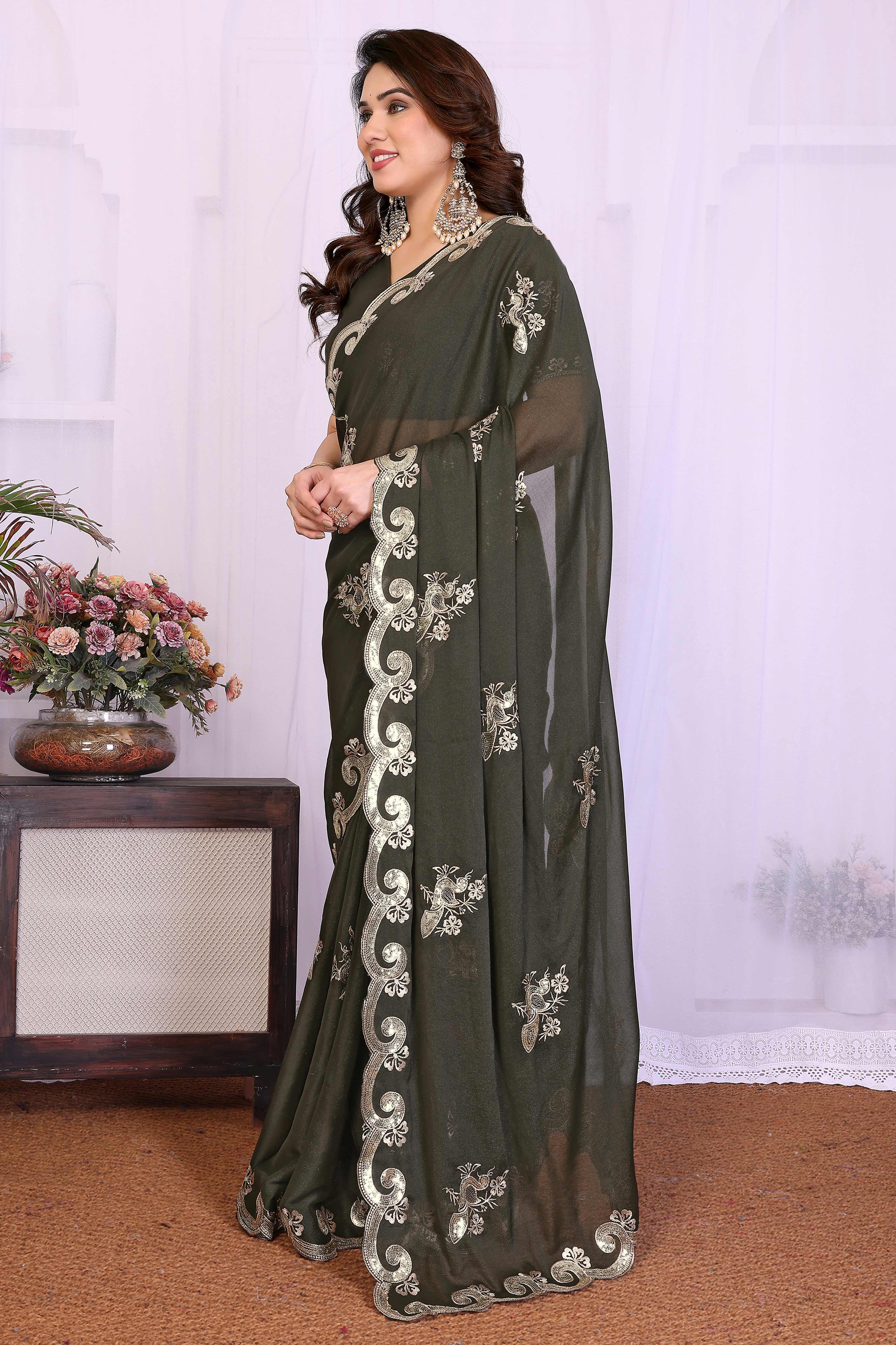 Charming Mehendi Green Floral & Peacock Motif Georgette Saree Enhanced With Sequins Embroidery