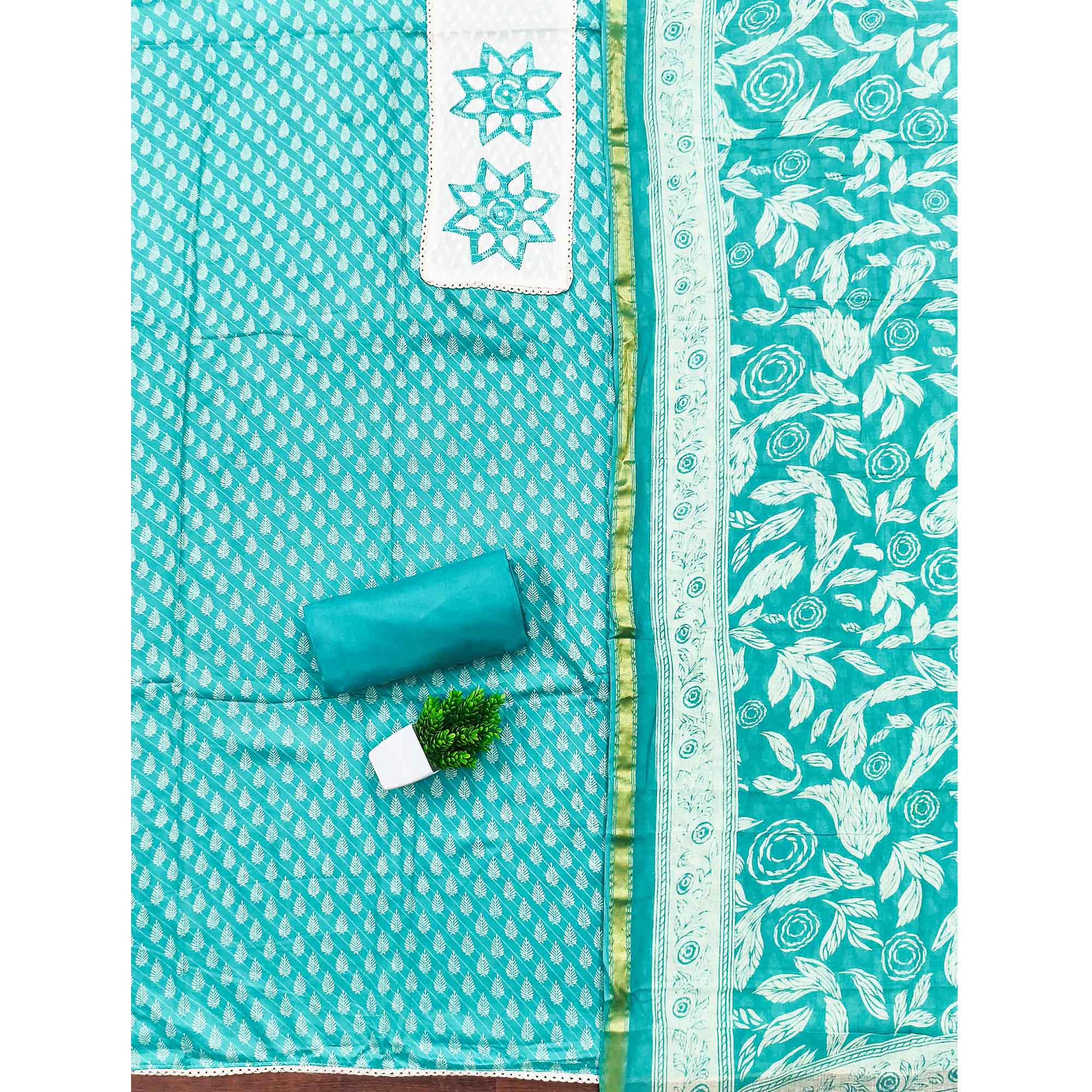 Turquoise Leaf & Striped Print Pure Cotton Dress Material Accented With Floral Embroidered Neckline