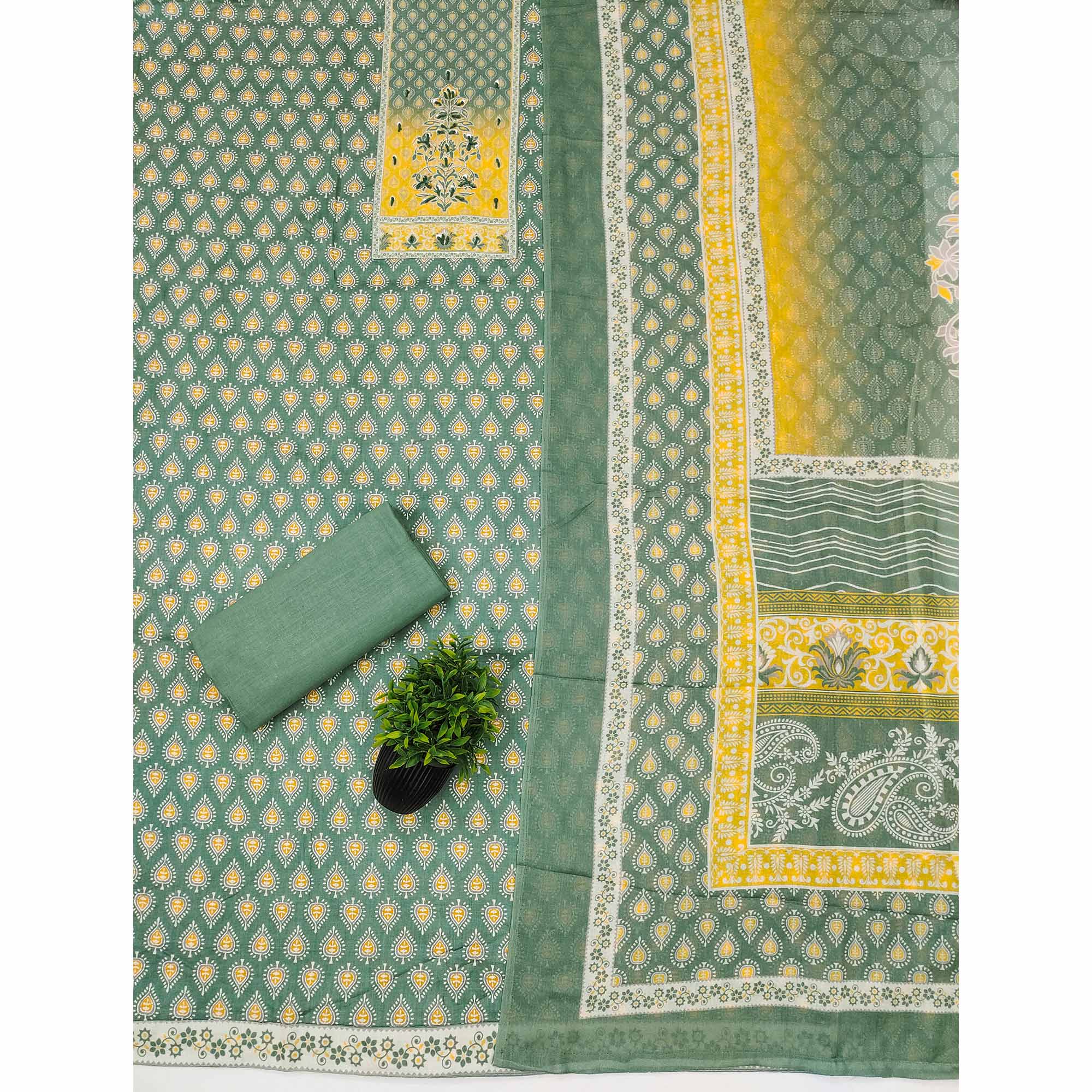 Green Pure Cotton Dress Material Accented With Sparkling Sequin Embroidery Work