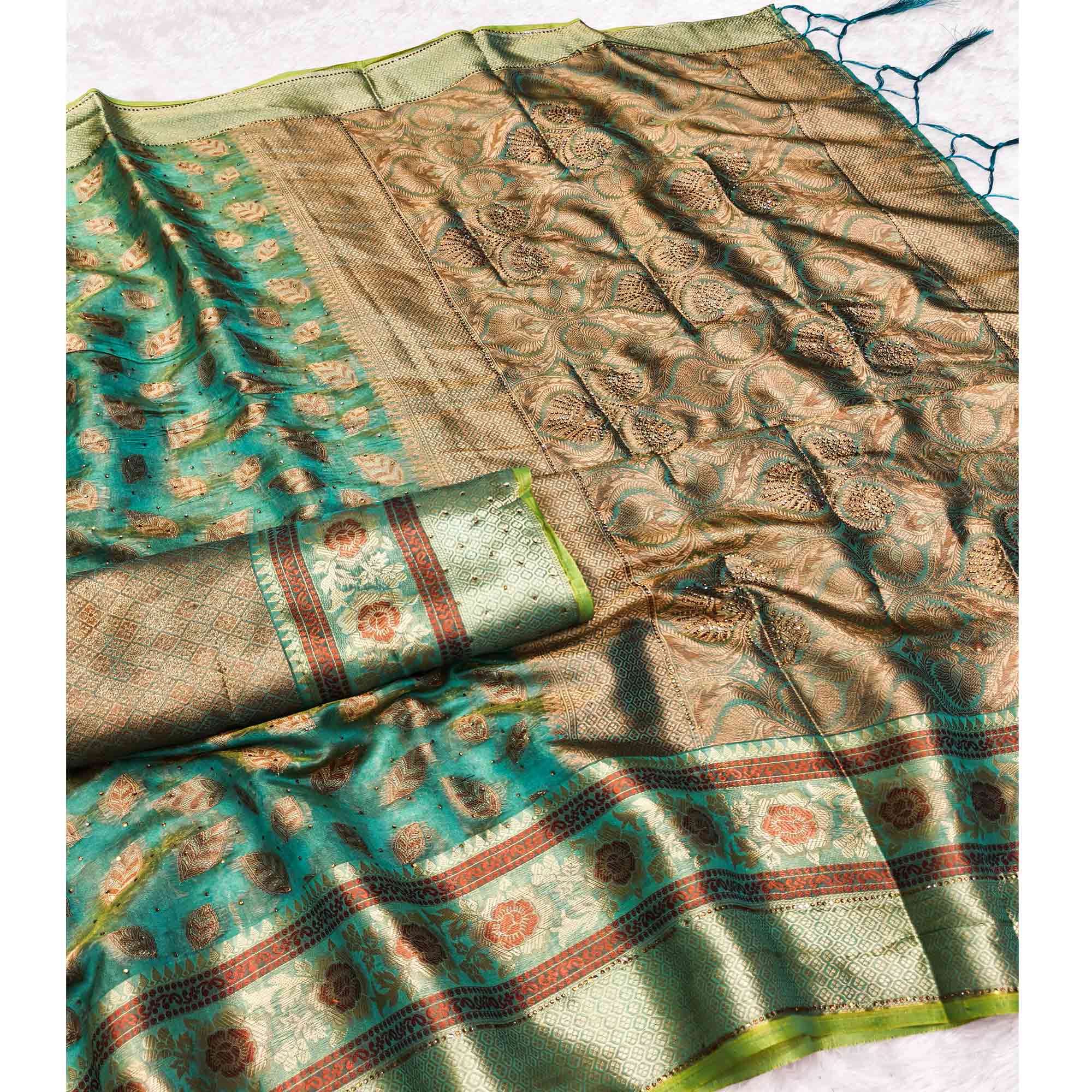 Turquoise Woven Banarasi Crunchy Silk Saree With Leaf & Floral Motifs Accented By Sparkling Stone