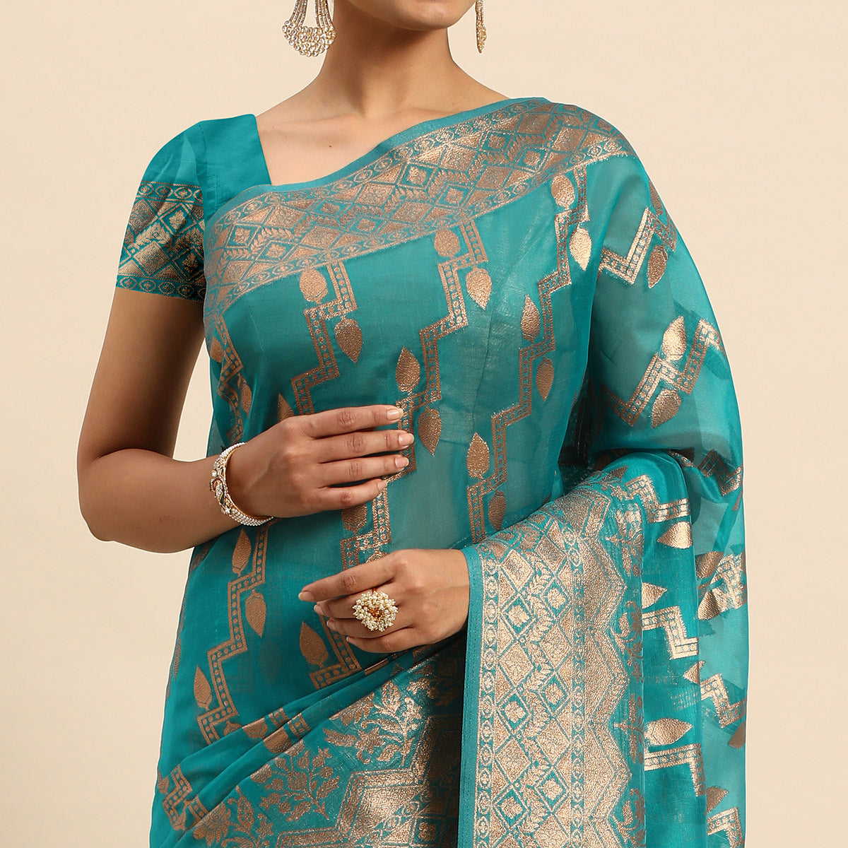 Turquoise Floral Woven Organza Silk Saree With Tassels