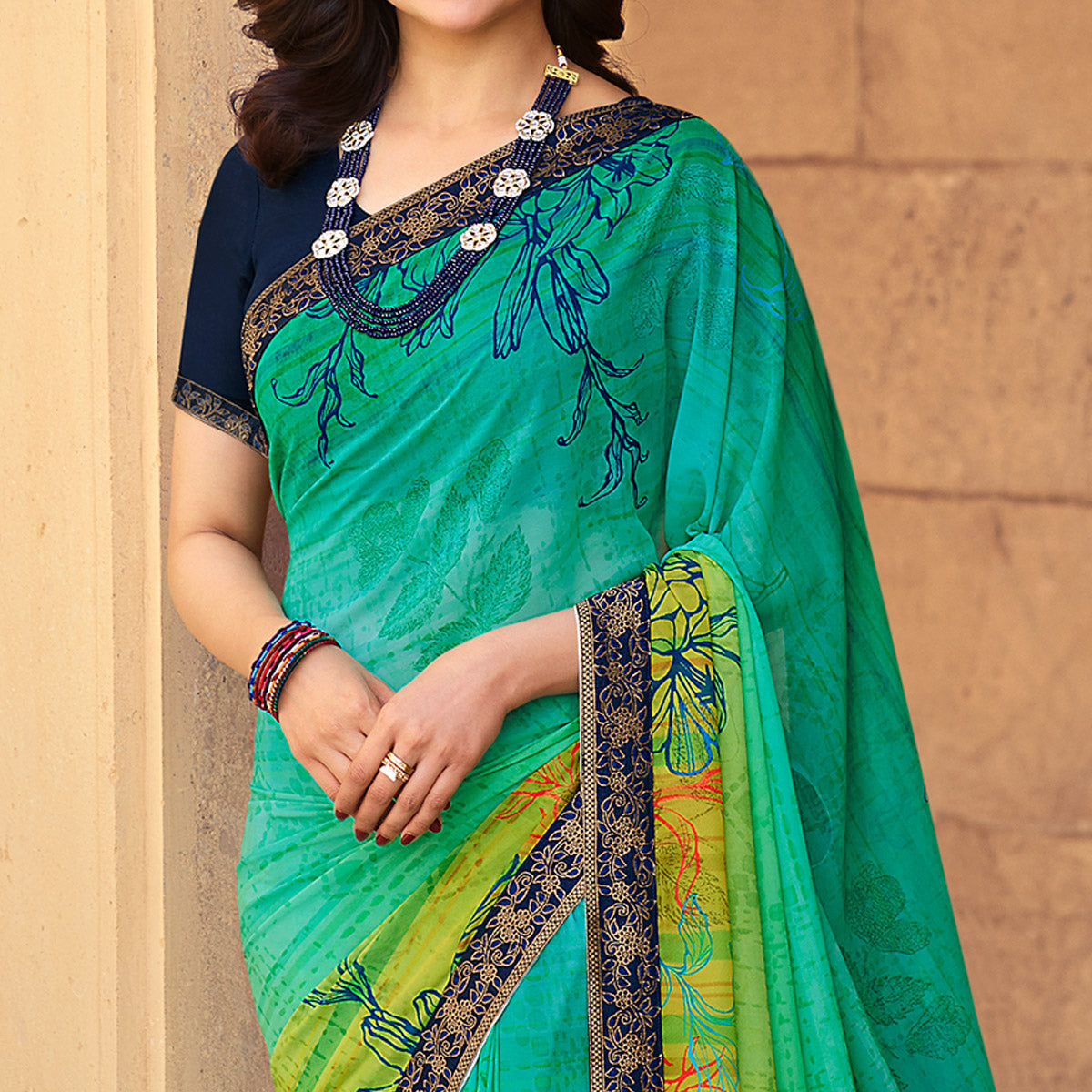 Turquoise Floral Printed Georgette Saree
