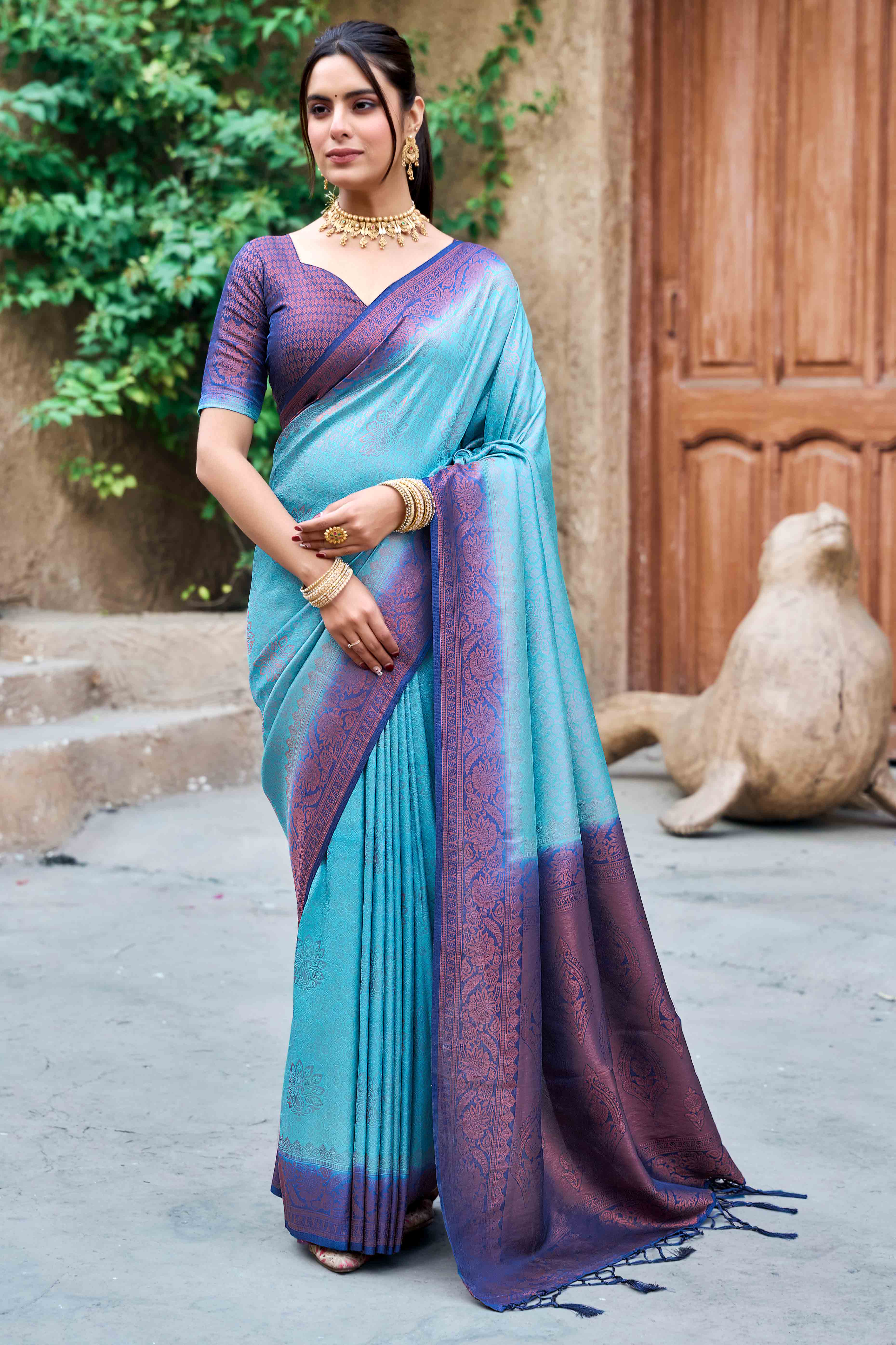 Blue Banarasi Silk Saree Featuring Elegant Floral Woven & Delicate Tassel Edging