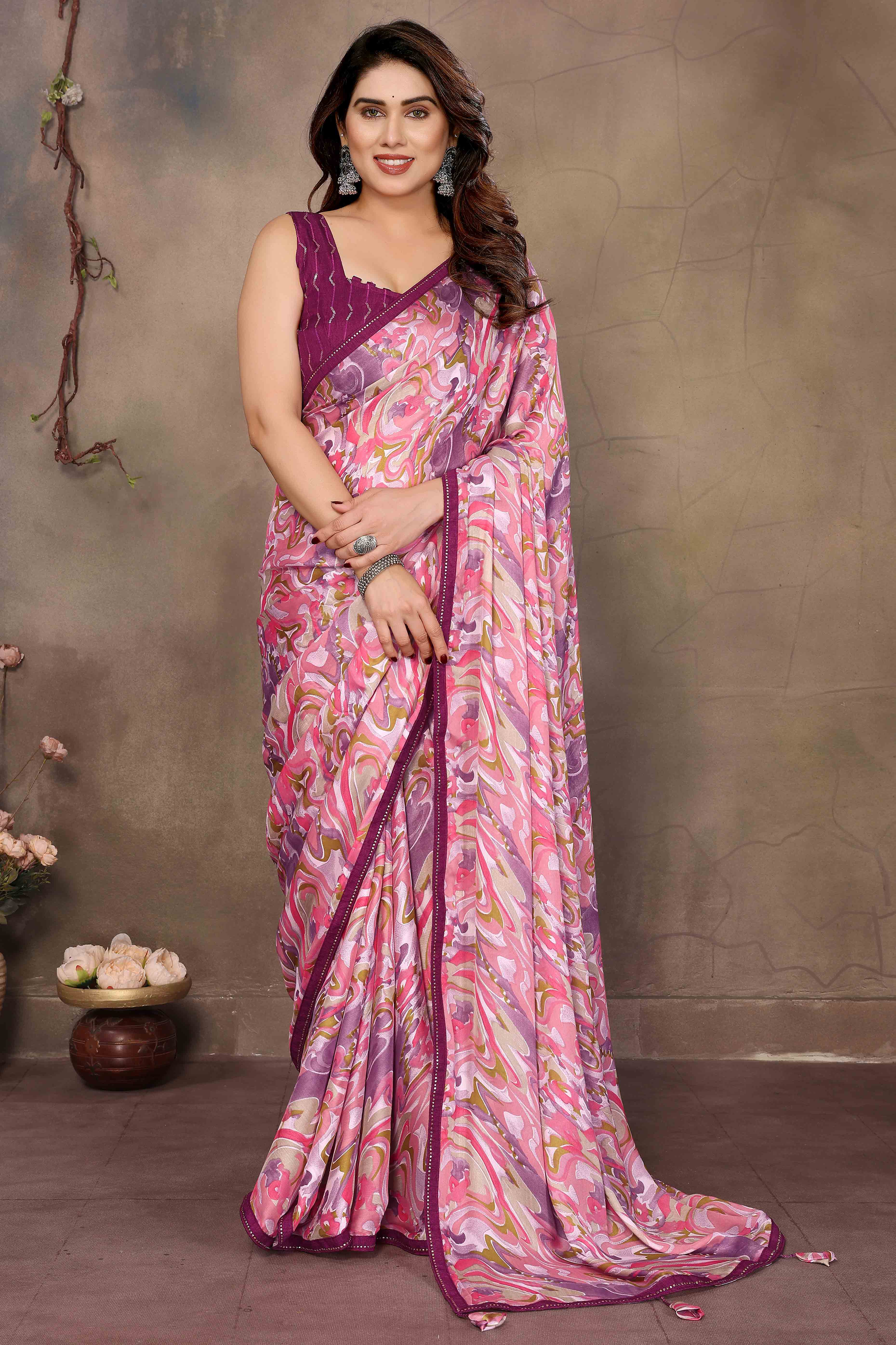 Pink Chiffon Party Saree with Vibrant Floral Patterns and Graceful Drape