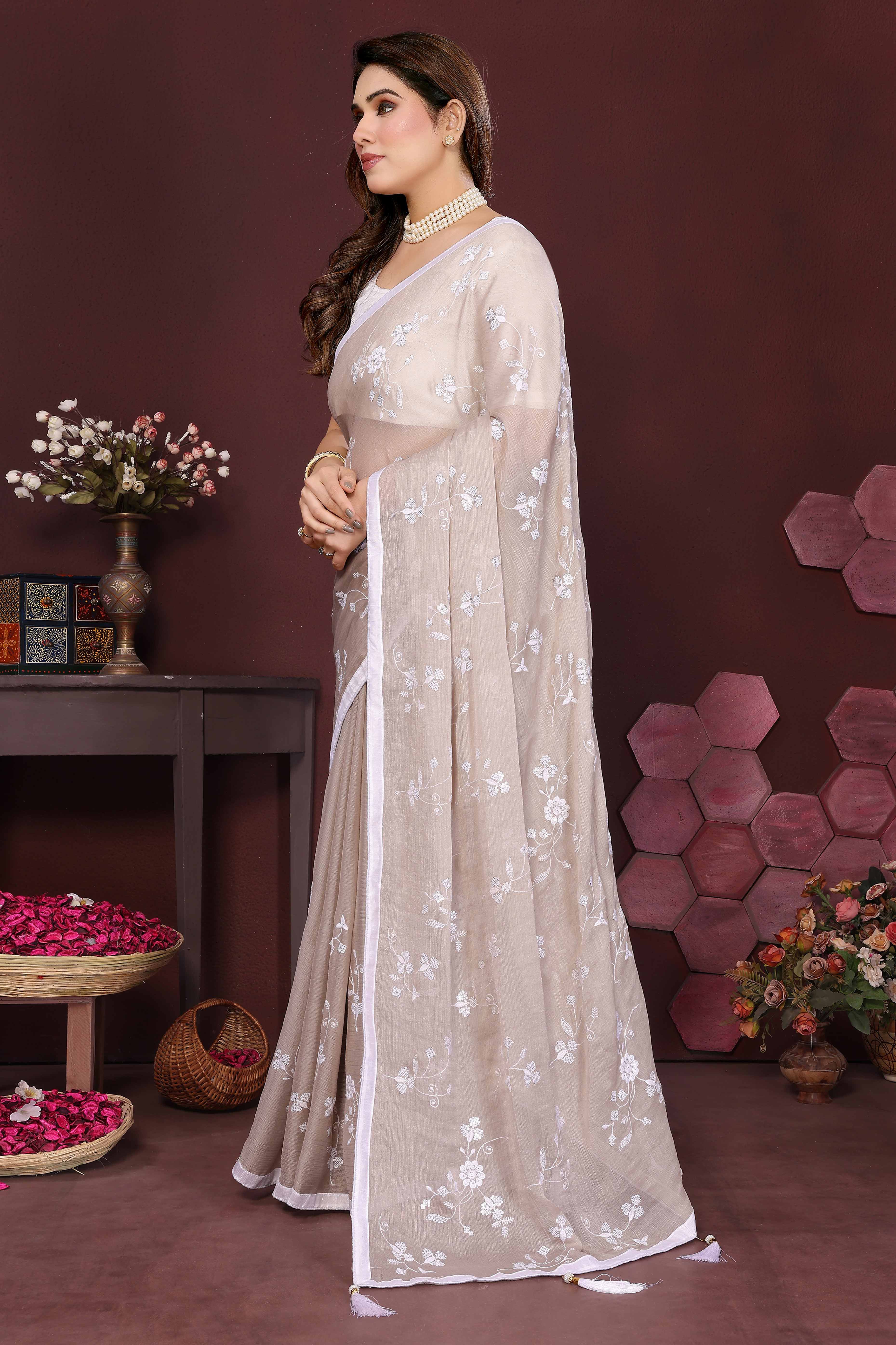 Beige Bloom Saree adorned with Moss Floral Embroidery and Delicate Lace Border
