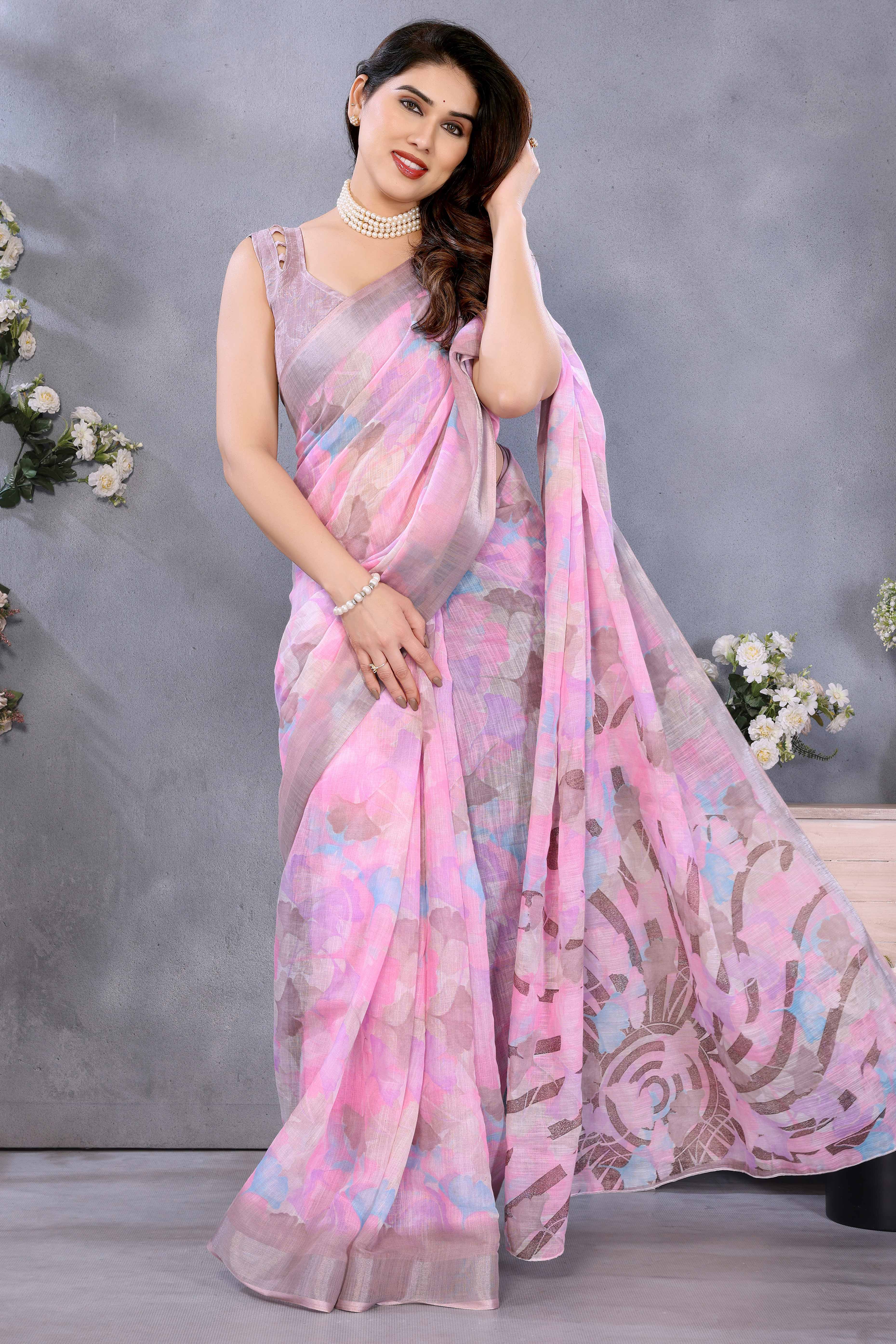 Pink Floral Printed Linen Saree Accented With A Classic Patta Border