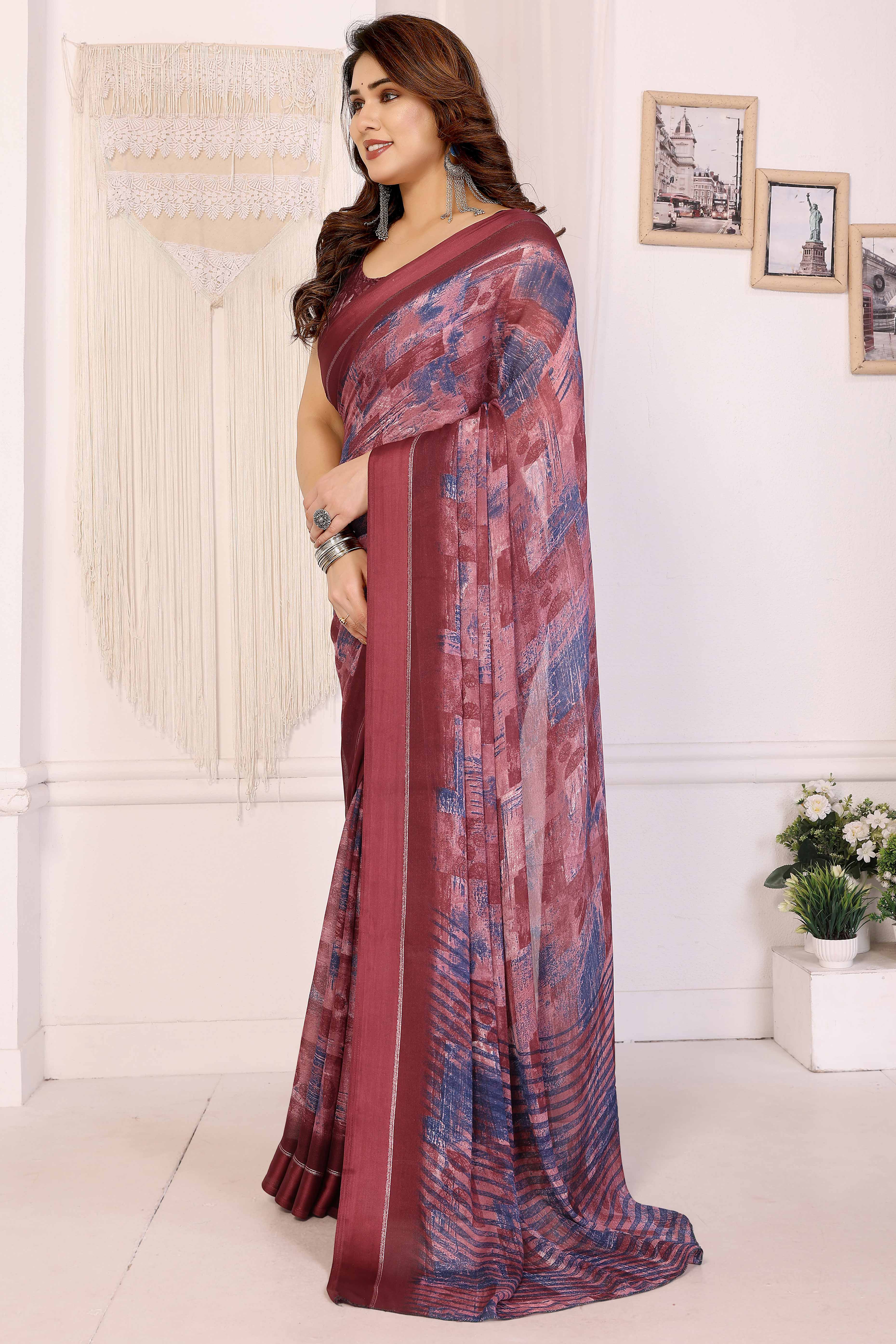 Trendy Maroon Moss Crepe Saree with Floral Motifs and Satin Border