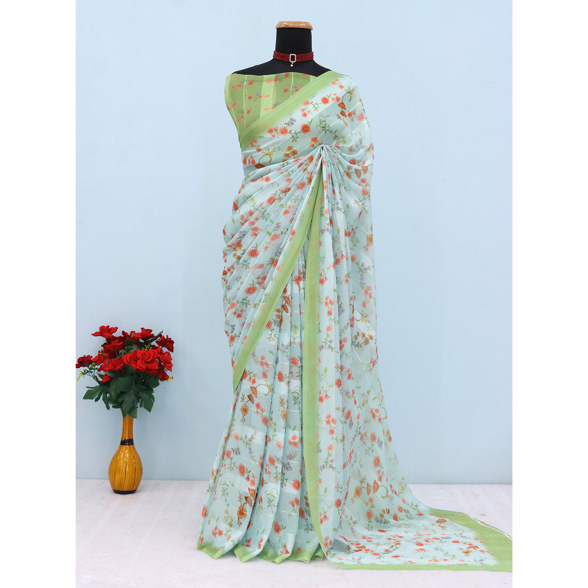 Sky Blue Bloom Floral Digital Printed Georgette Saree Accentuated With Graceful Zari Stripes