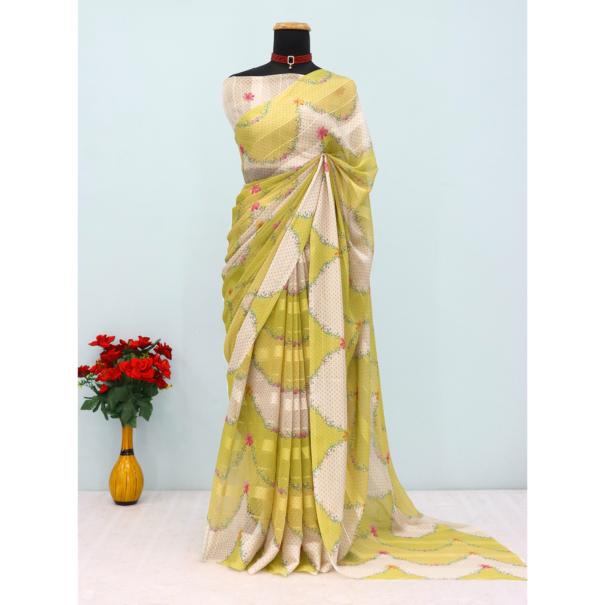 Lemon Yellow Bloom Floral Digital Printed Georgette Saree Accentuated With Graceful Zari Stripes