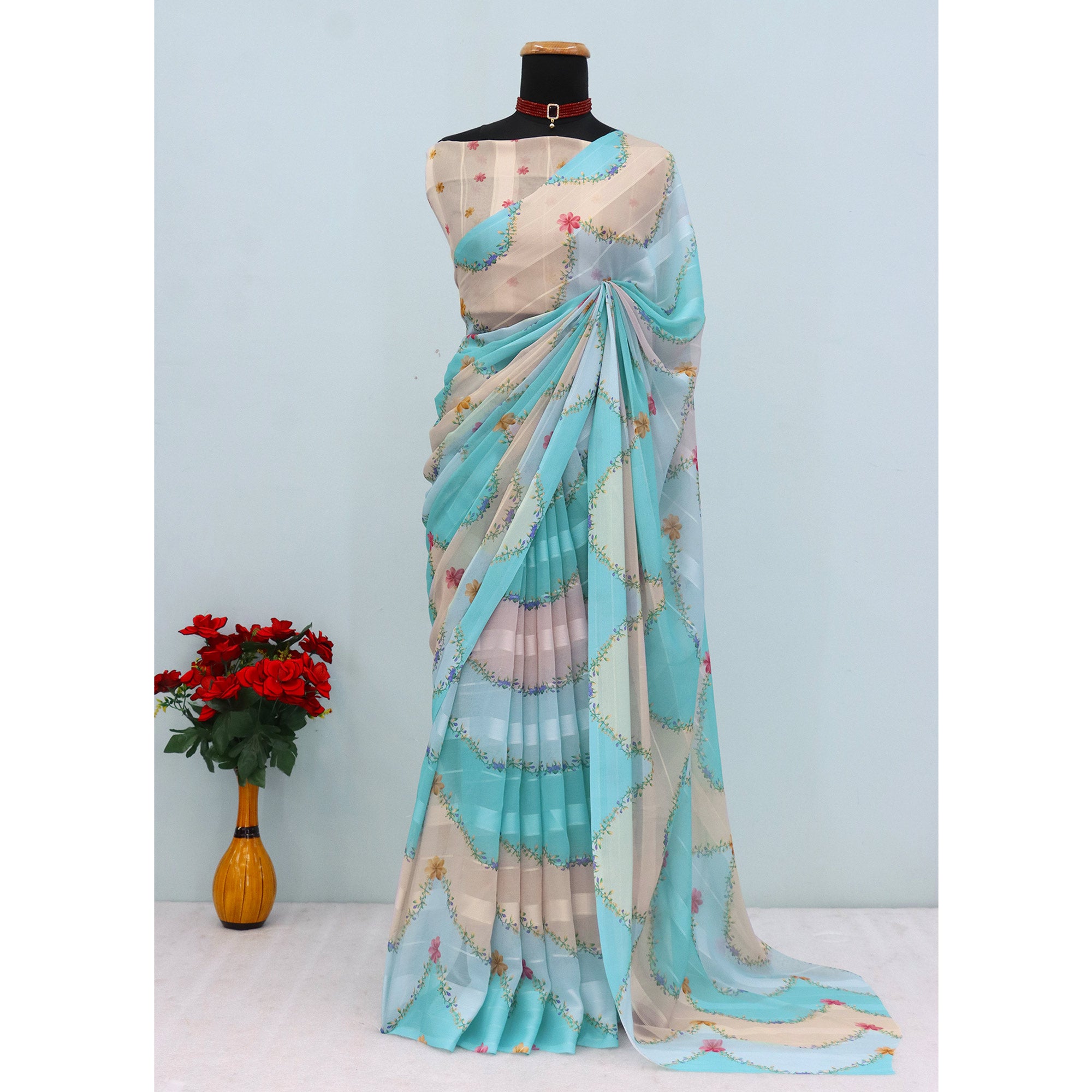 Sky Blue Bloom Floral Digital Printed Georgette Saree Accentuated With Graceful Zari Stripes