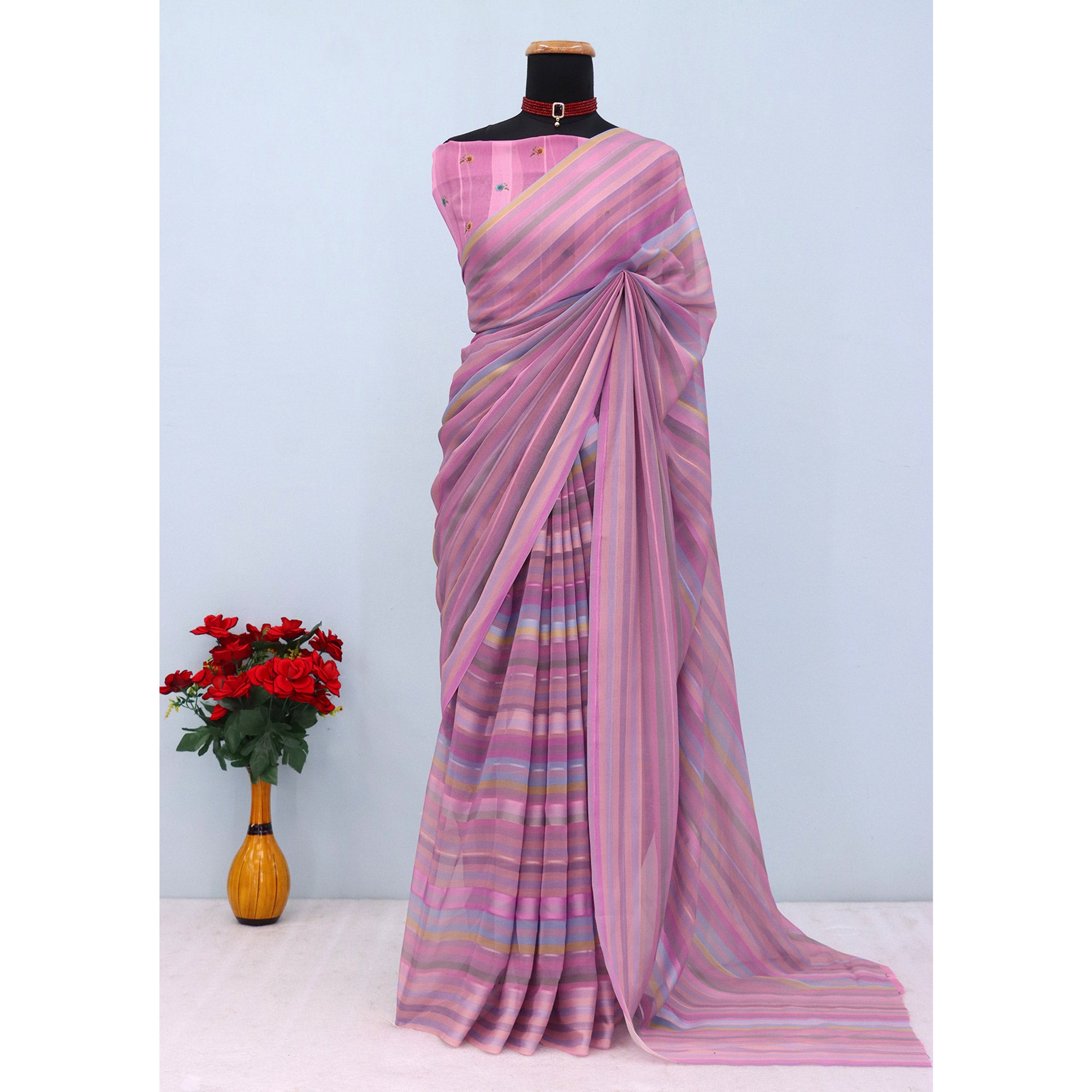 Pink Bloom Floral Digital Printed Georgette Saree Accentuated With Graceful Zari Stripes