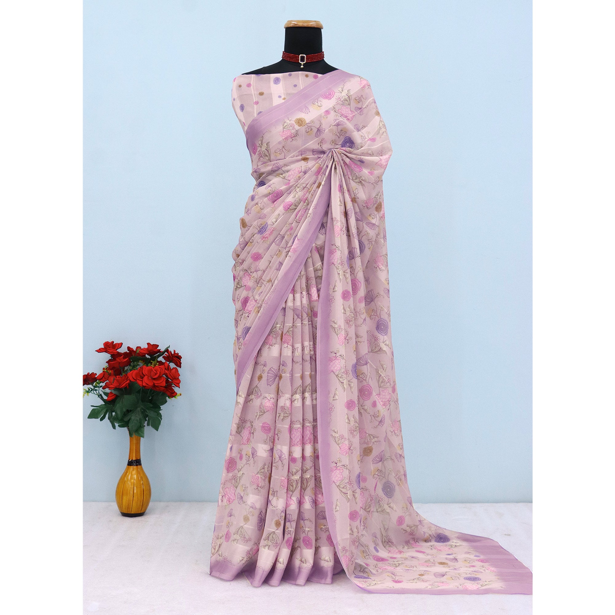 Purple Bloom Floral Digital Printed Georgette Saree Accentuated With Graceful Zari Stripes