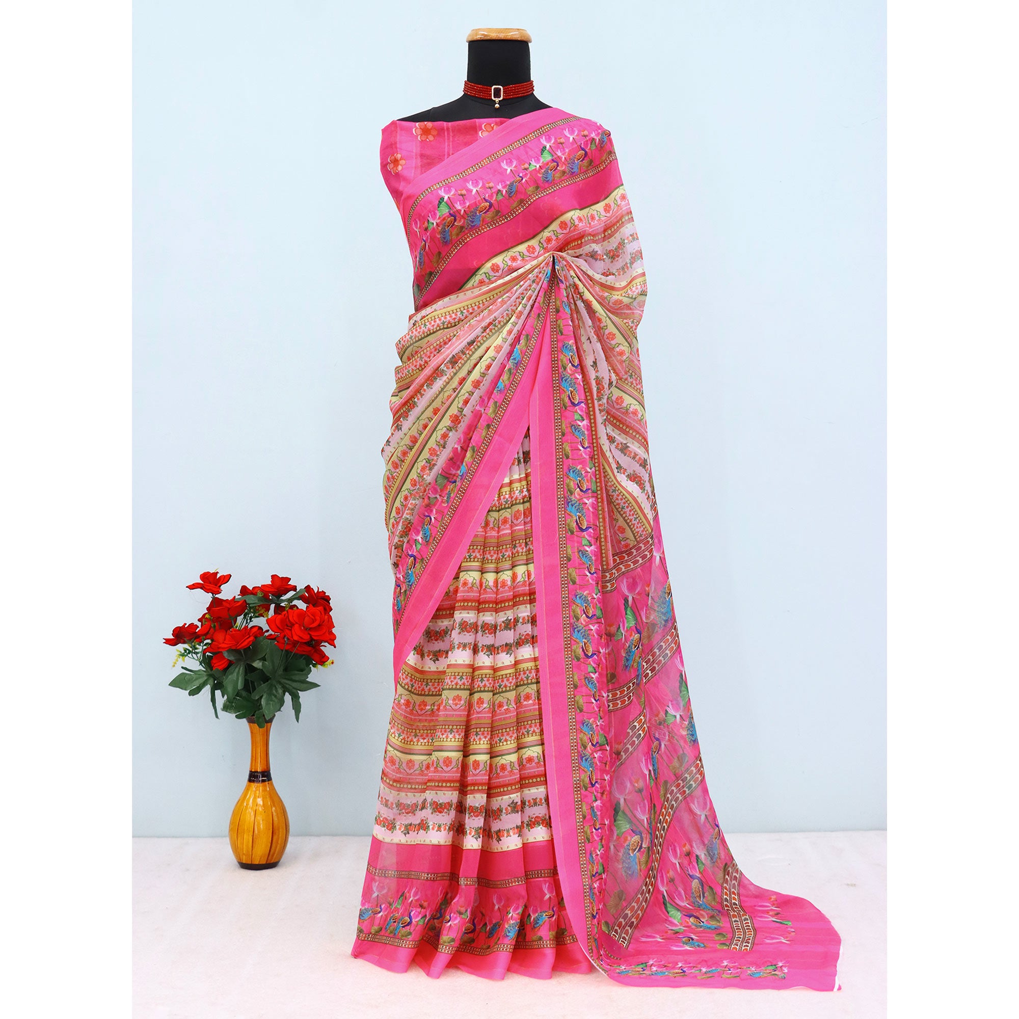 Charming Pink & Yellow Floral Digital Printed Georgette Saree Accentuated With Zari Stripes