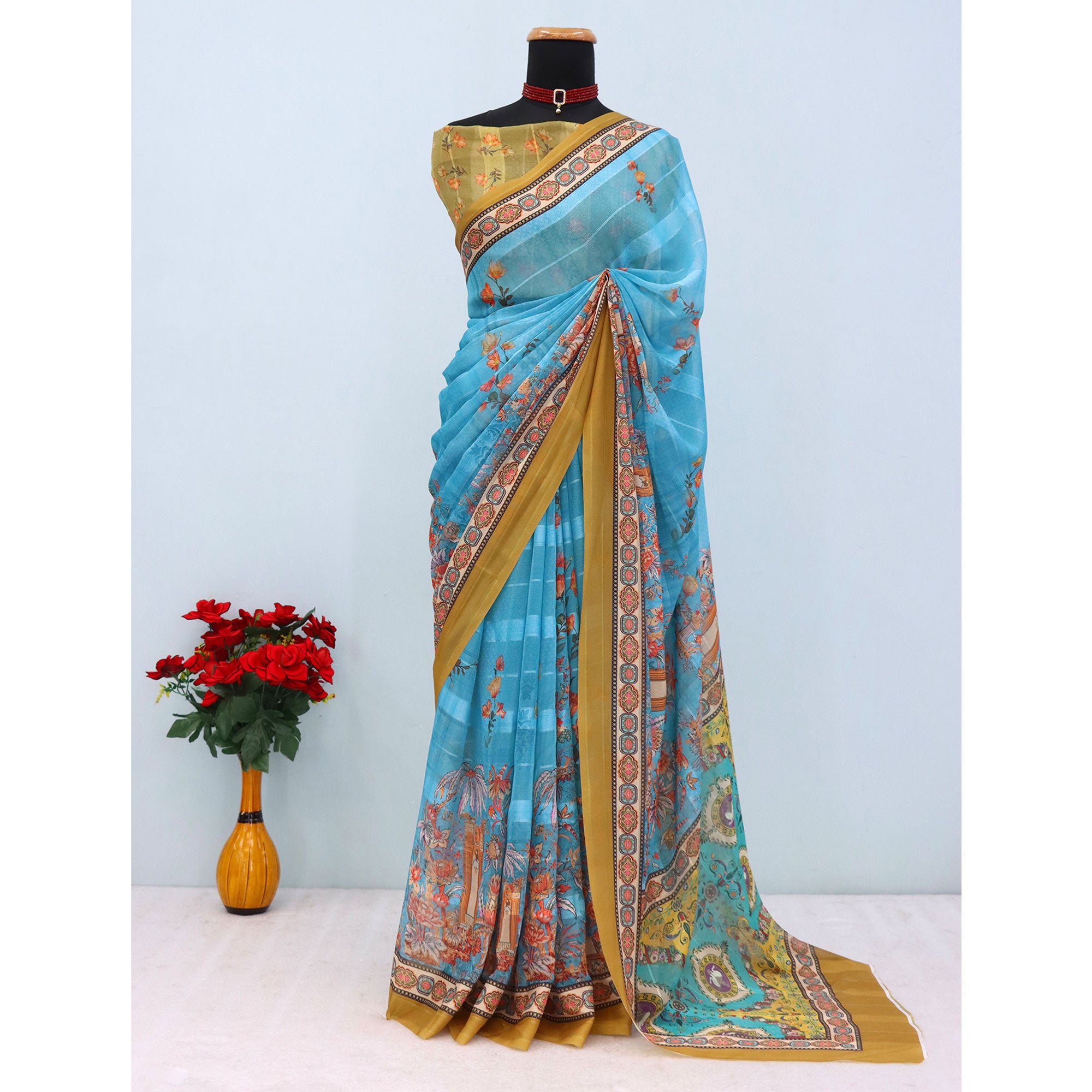 Charming Blue & Mehendi Floral Digital Printed Georgette Saree Accentuated With Zari Stripes